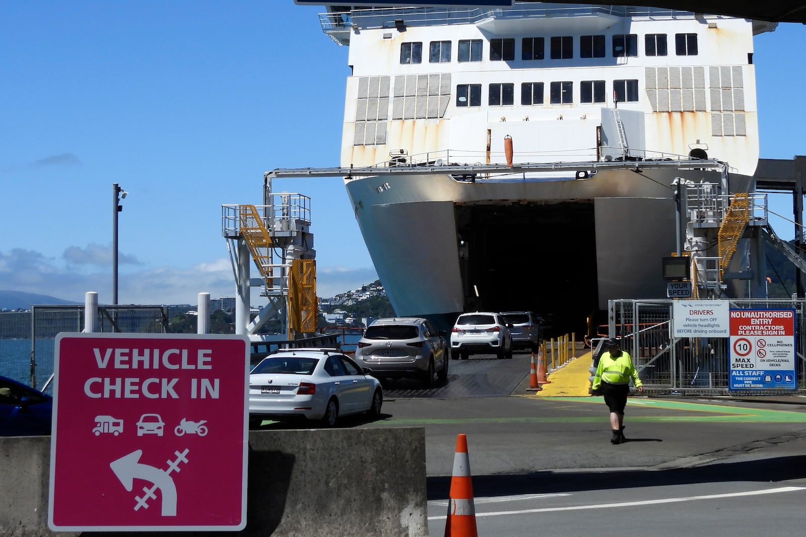 Cars board an Interislander ferry in Wellington, New Zealand, on Tuesday, Jan. 7, 2025. (AP Photo/Charlotte Graham-McLay)