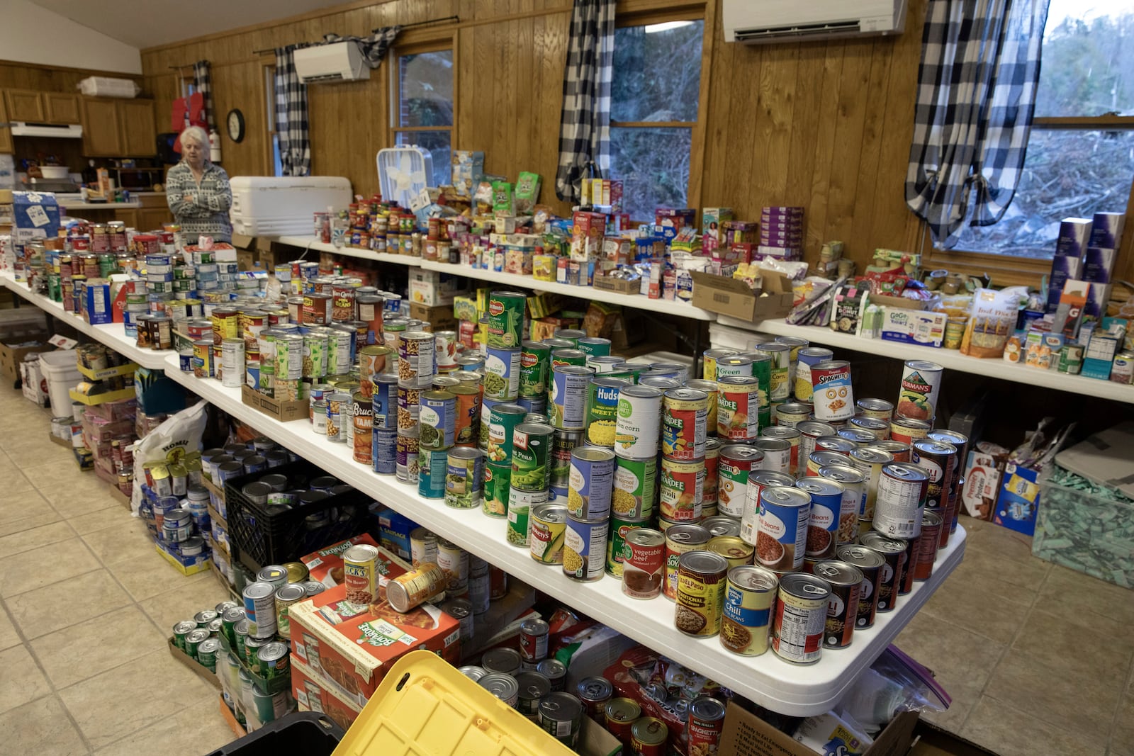 Food donations amassed at a resource hub operating out of the Beans Creek Church of the Lord Jesus Christ in Bakersville, N.C. on Oct. 9, 2024. (AP Photo/Gabriela Aoun Angueria)