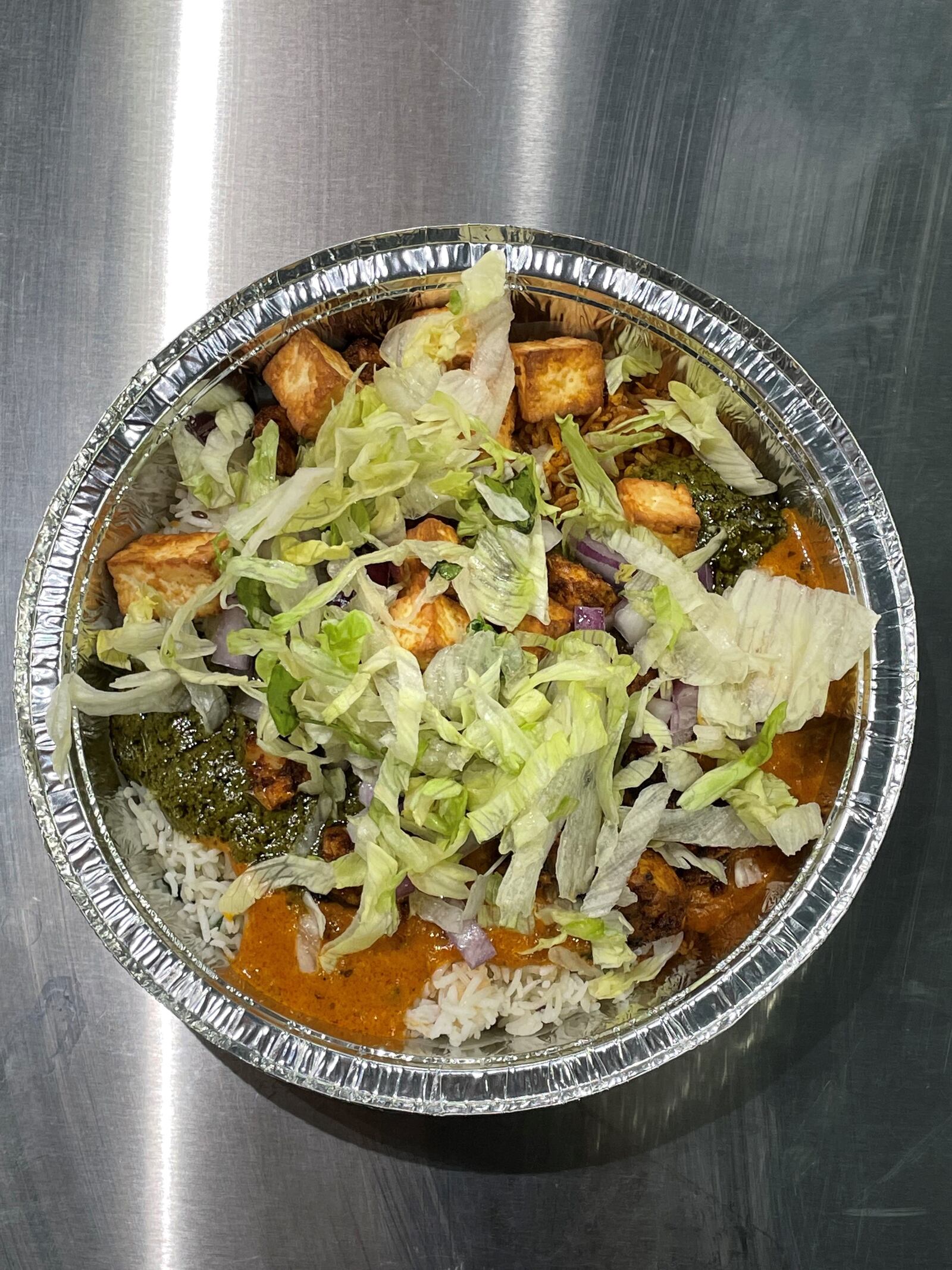 The Twist Indian Grill, a new fast-casual Indian restaurant where customers can create their own bowls and burritos, is holding a grand opening Thursday, Oct. 20 at 2627 S. Smithville Road (CONTRIBUTED PHOTO).