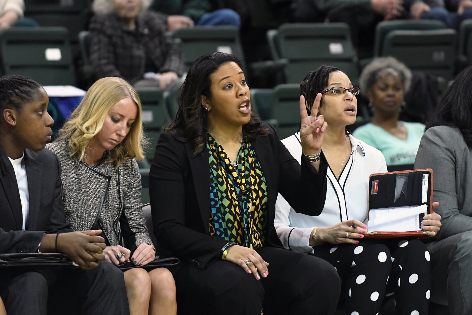 Wright State women’s basketball coach Katrina Merriweather (center) during a game against IUPUI last month at the Nutter Center. Keith Cole/CONTRIBUTED