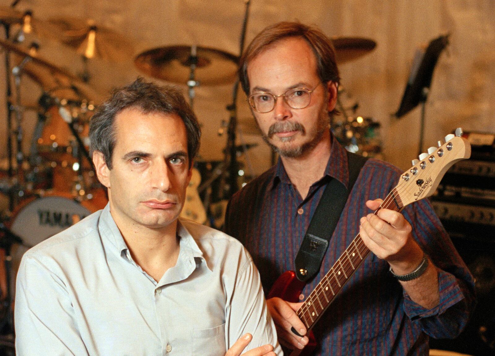 FILE - Donald Fagen, left, and Walter Becker of Steely Dan pose at New York's S.I.R. Studios on Aug. 5, 1993, before a rehearsal for their upcoming tour. Becker died in 2017. (AP Photo/Richard Drew, File)