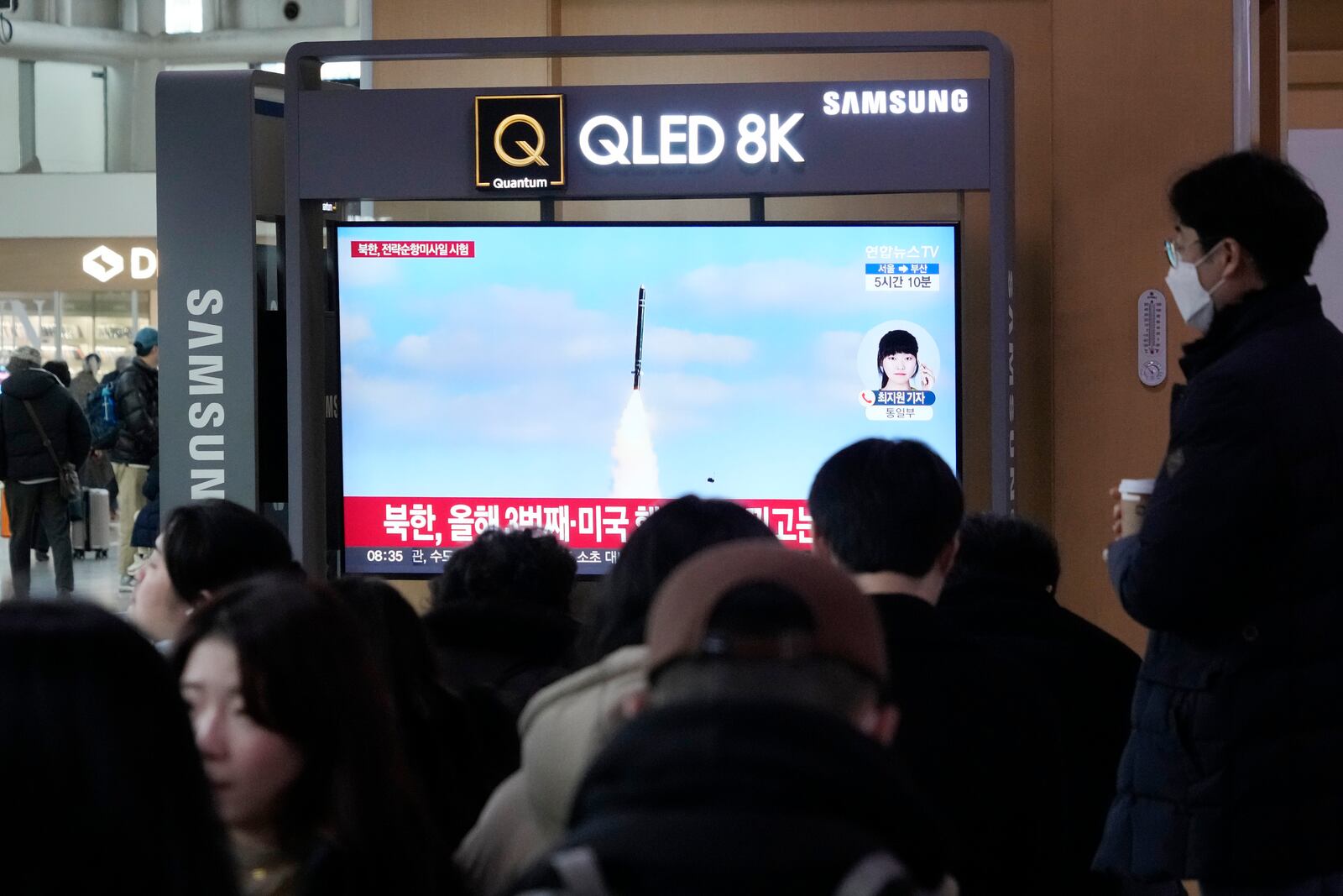 A TV screen shows an image of North Korea's missile launch during a news program at Seoul Railway Station in Seoul, South Korea, Sunday, Jan. 26, 2025. (AP Photo/Ahn Young-joon)