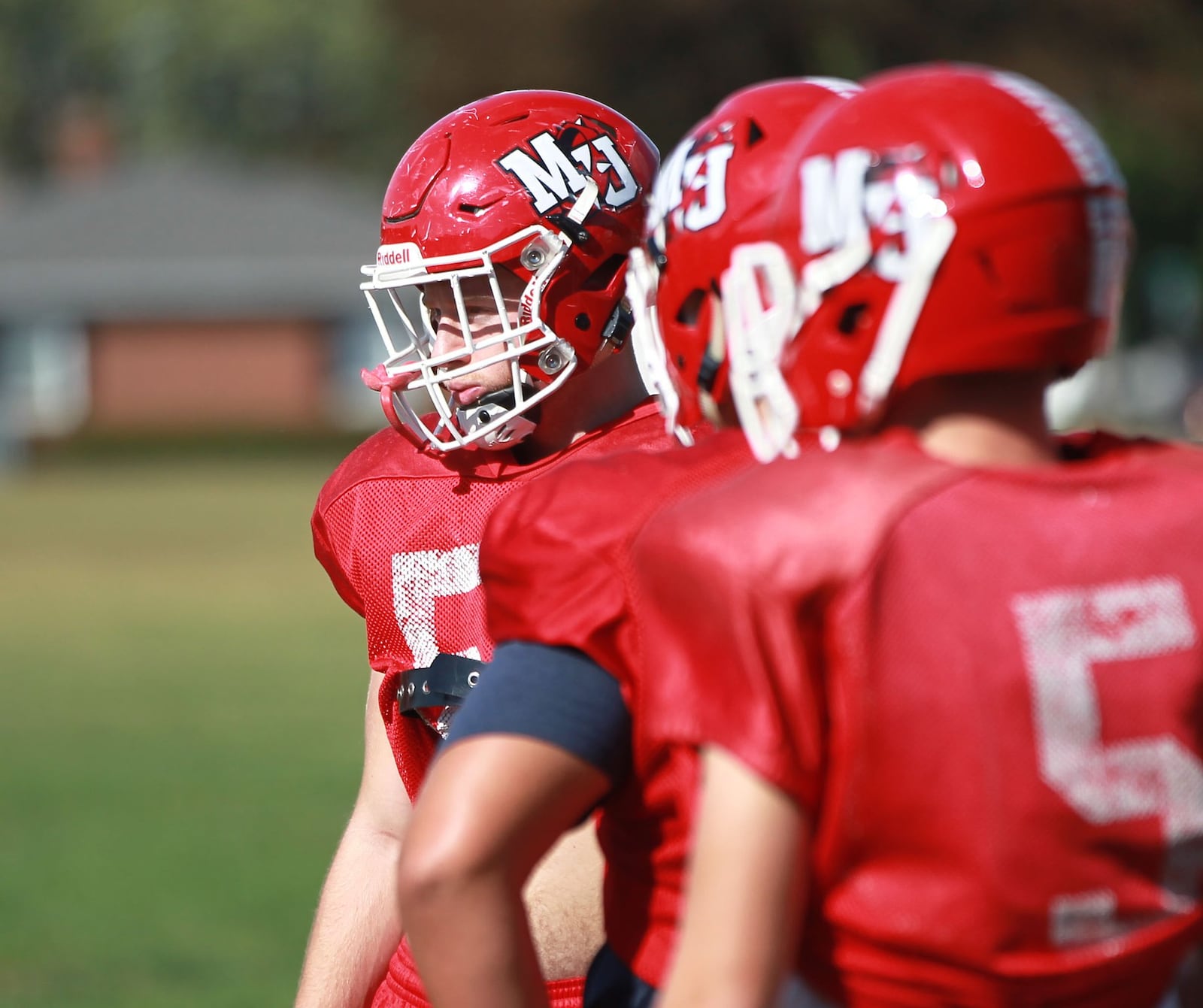 Milton-Union junior defensive lineman Tim Artz (left) and the Bulldogs practice on Wednesday, Oct. 2, 2019. MARC PENDLETON / STAFF