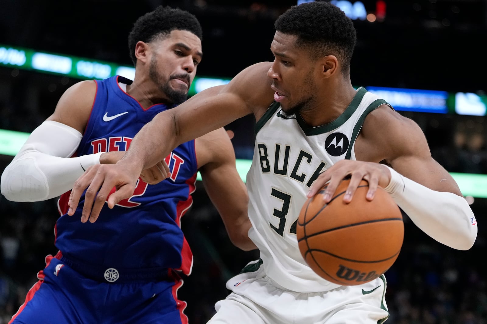 Milwaukee Bucks' Giannis Antetokounmpo tries to get past Detroit Pistons' Tobias Harris during the second half of an NBA basketball game Wednesday, Nov. 13, 2024, in Milwaukee. (AP Photo/Morry Gash)