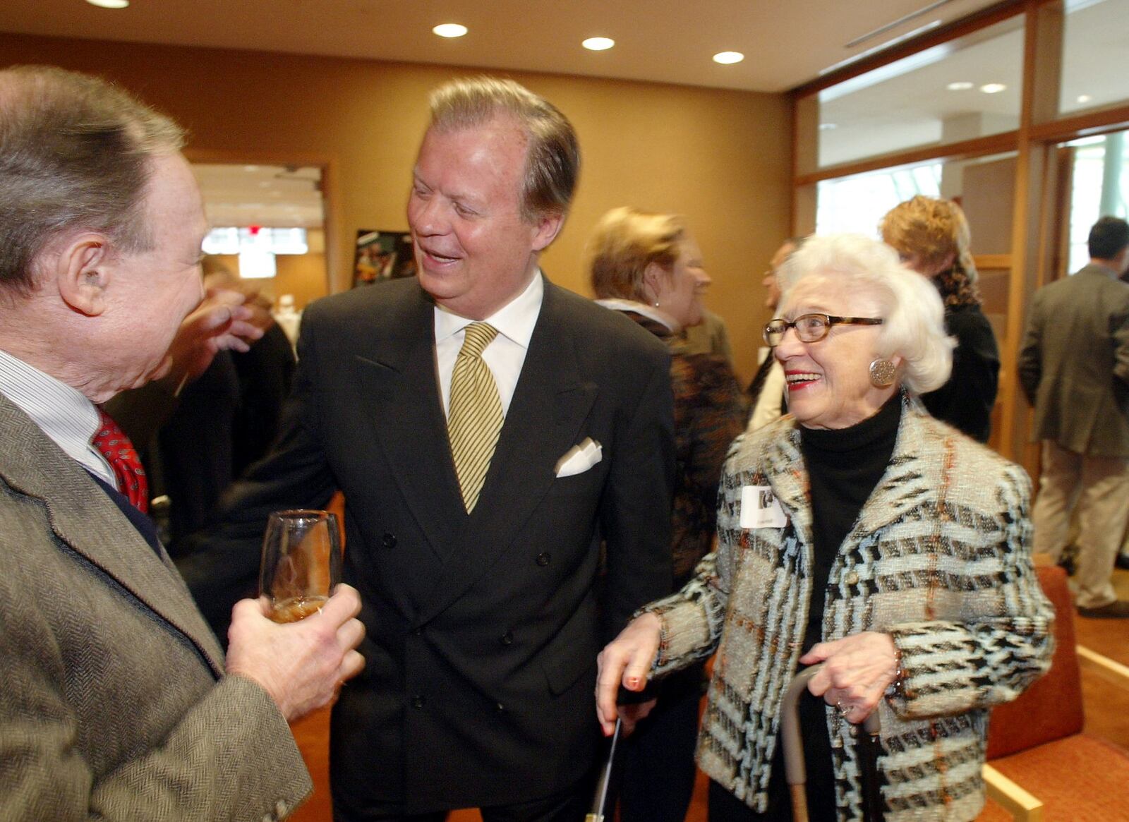 Tony Hall, who represented the Dayton area in the U.S. House of Representatives for 24 years, returned home in 2004 for an appearance at a Dayton Council on World Affairs luncheon at the Schuster Center. Hall, then the Rome-based U.S. ambassador to the United Nations’ food and agriculture organizations, attended with his mother Ann Hall, right, and talks with Burt Saidel at left. FILE PHOTO