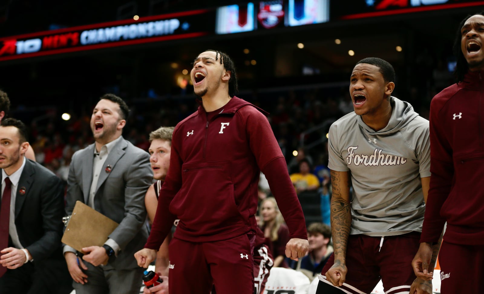 Wayne grad Darius Quisenberry, center, reacts to a Fordham dunk during a game against Davidson on Friday, March 11, 2022, in the quarterfinals of the Atlantic 10 Conference tournament at Capital One Arena in Washington, D.C. David Jablonski/Staff