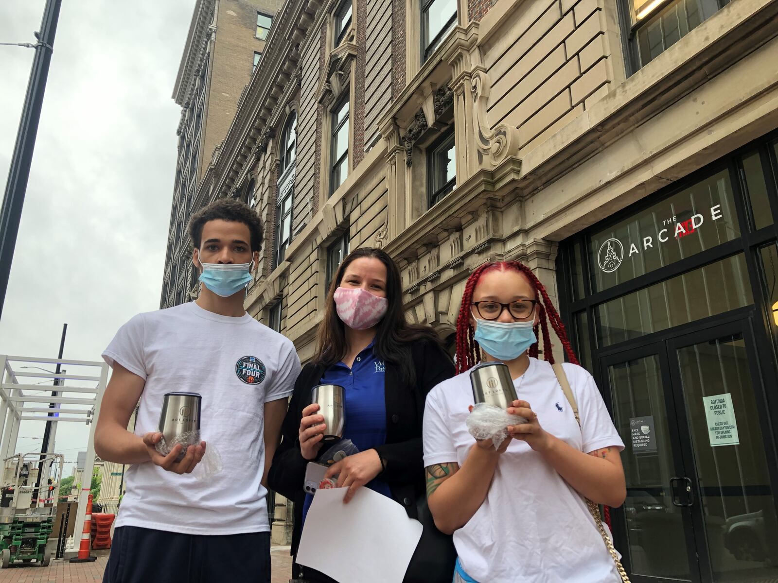 Jillena McConnell and her children will live in an apartment in the Dayton Arcade. She said she really looks forward to living there and thanked the property managers for all their assistance. She met the income restrictions to live in the Art Lofts. CORNELIUS FROLIK / STAFF