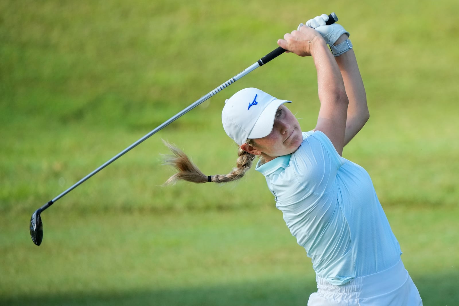 Bailey Tardy of the United States watches her fairway shot on the third hole during the second round of Maybank LPGA Championship golf tournament at Kuala Lumpur Golf and Country club in Kuala Lumpur, Friday, Oct. 25, 2024. (AP Photo/Vincent Thian)