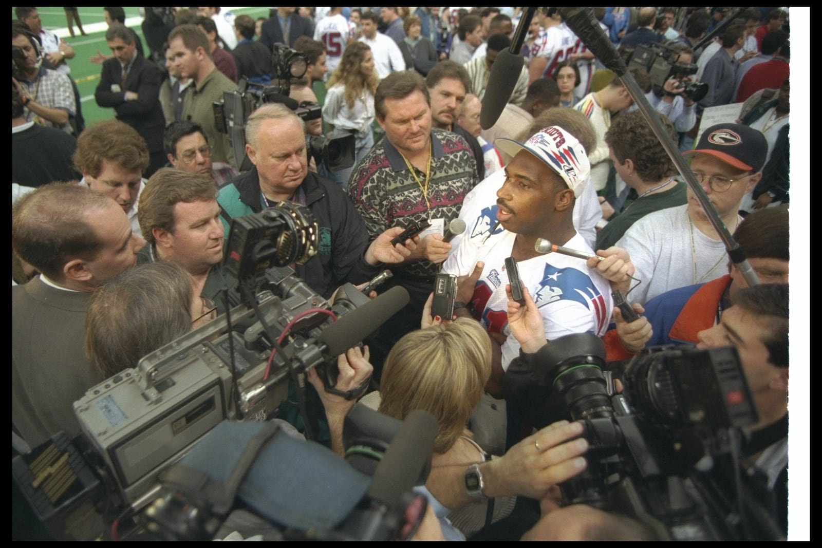 21 Jan 1997: Running back Keith Byars of the New England Patriots gets interviewed during Media Day for Super Bowl XXXI against the Green Bay Packers at the Superdome in New Orleans, Louisiana. The Packers won the game, 35-21.