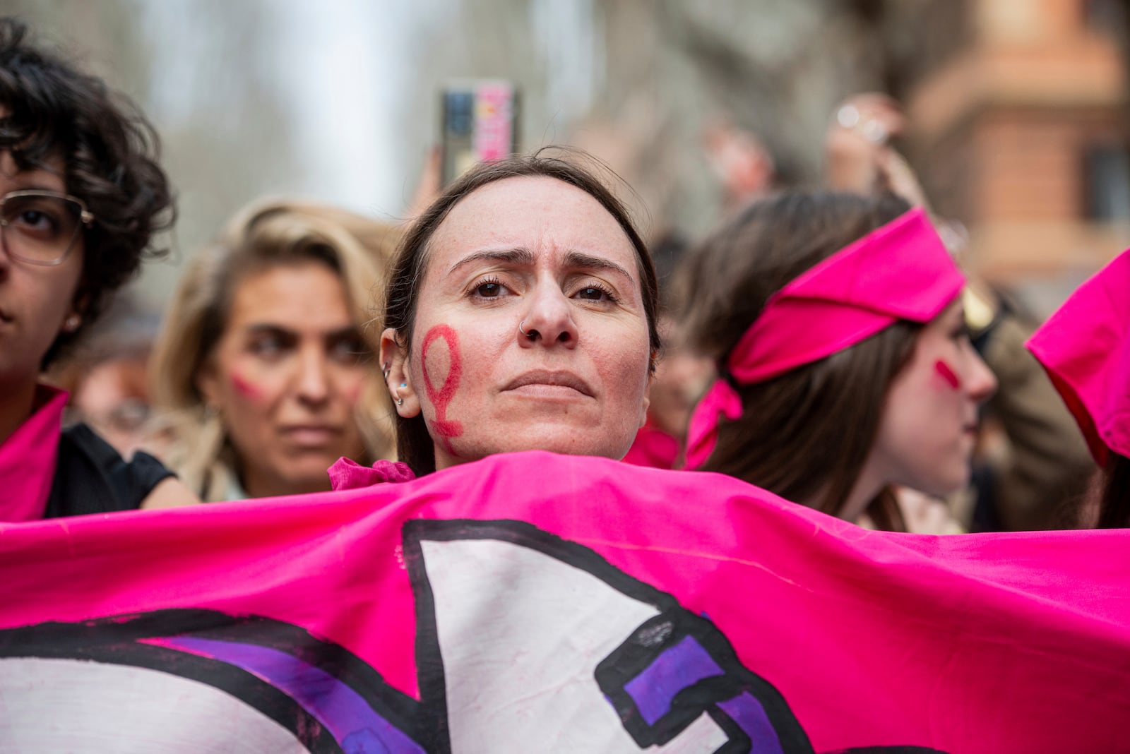 Women take part in a Transfeminist strike on International Women's Day, outside the Colosseum, in Rome, Saturday, March 8, 2025 (Valentina Stefanelli/LaPresse via AP)