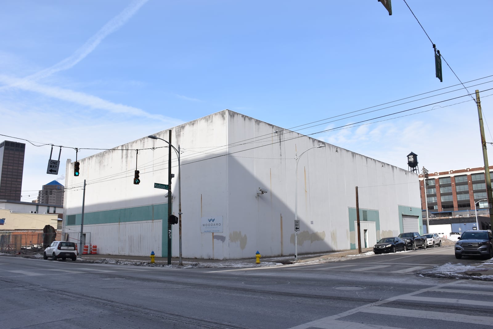 Woodard Development wants to convert this building at East Third and Madison streets in downtown Dayton into new offices. The building once belong to KK Motorcycle Supply. CORNELIUS FROLIK / STAFF