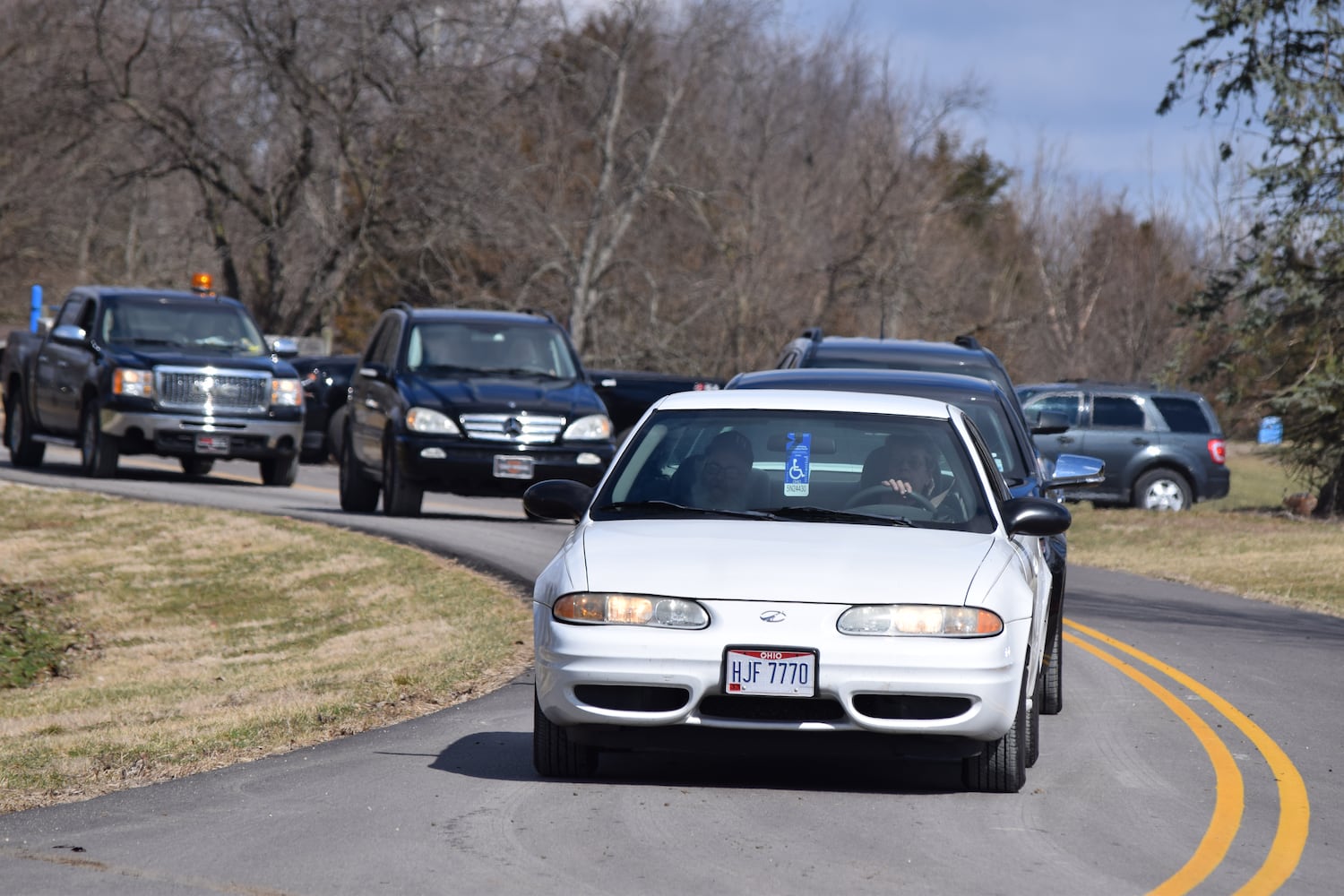 PHOTOS: Thousands of Outlaws attend motorcycle gang leaders funeral at Montgomery County Fairgrounds.