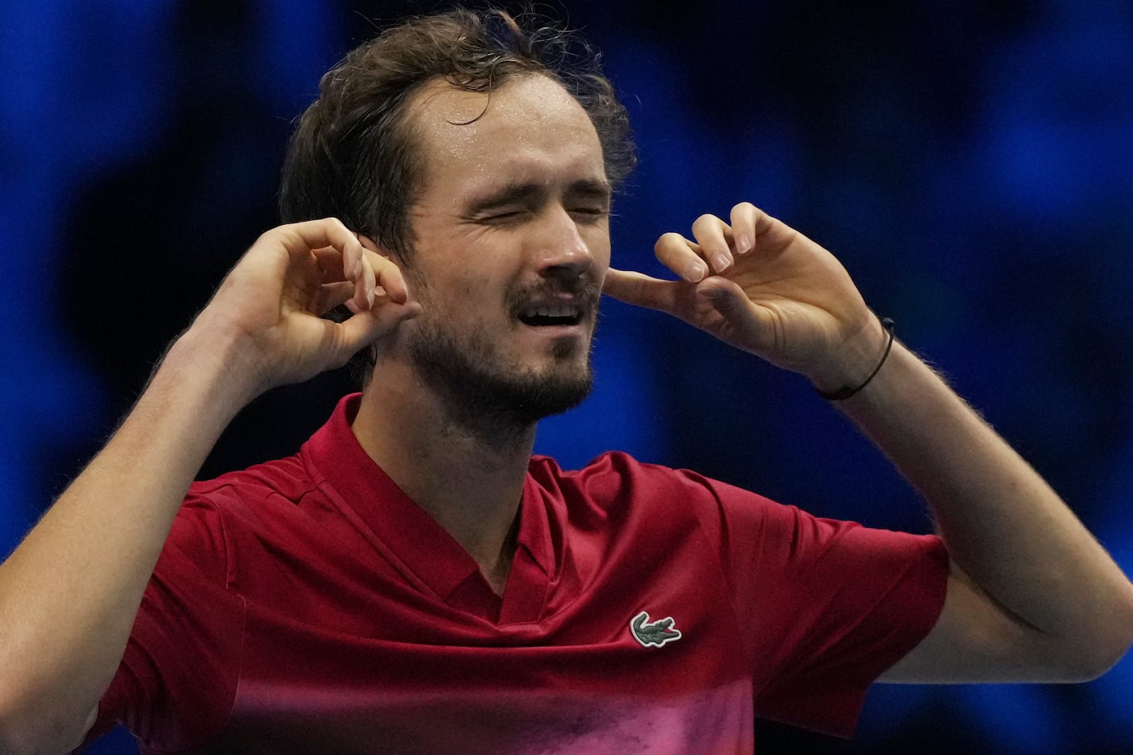 Russia's Daniil Medvedev Australia's Alex de Minaur returns the ball to Russia's Daniil Medvedev Australia's Alex de Minaur during their singles tennis match of the ATP World Tour Finals at the Inalpi Arena, in Turin, Italy, Tuesday, Nov. 12, 2024. (AP Photo/Antonio Calanni)