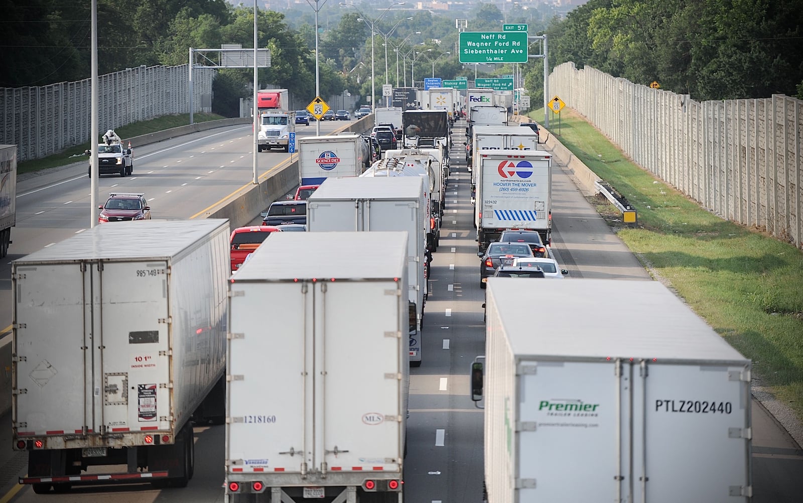 Traffic backed up for miles Friday morning on I-75 south after a fatal crash near Stanley Avenue closed the southbound lanes. MARSHALL GORBY / STAFF