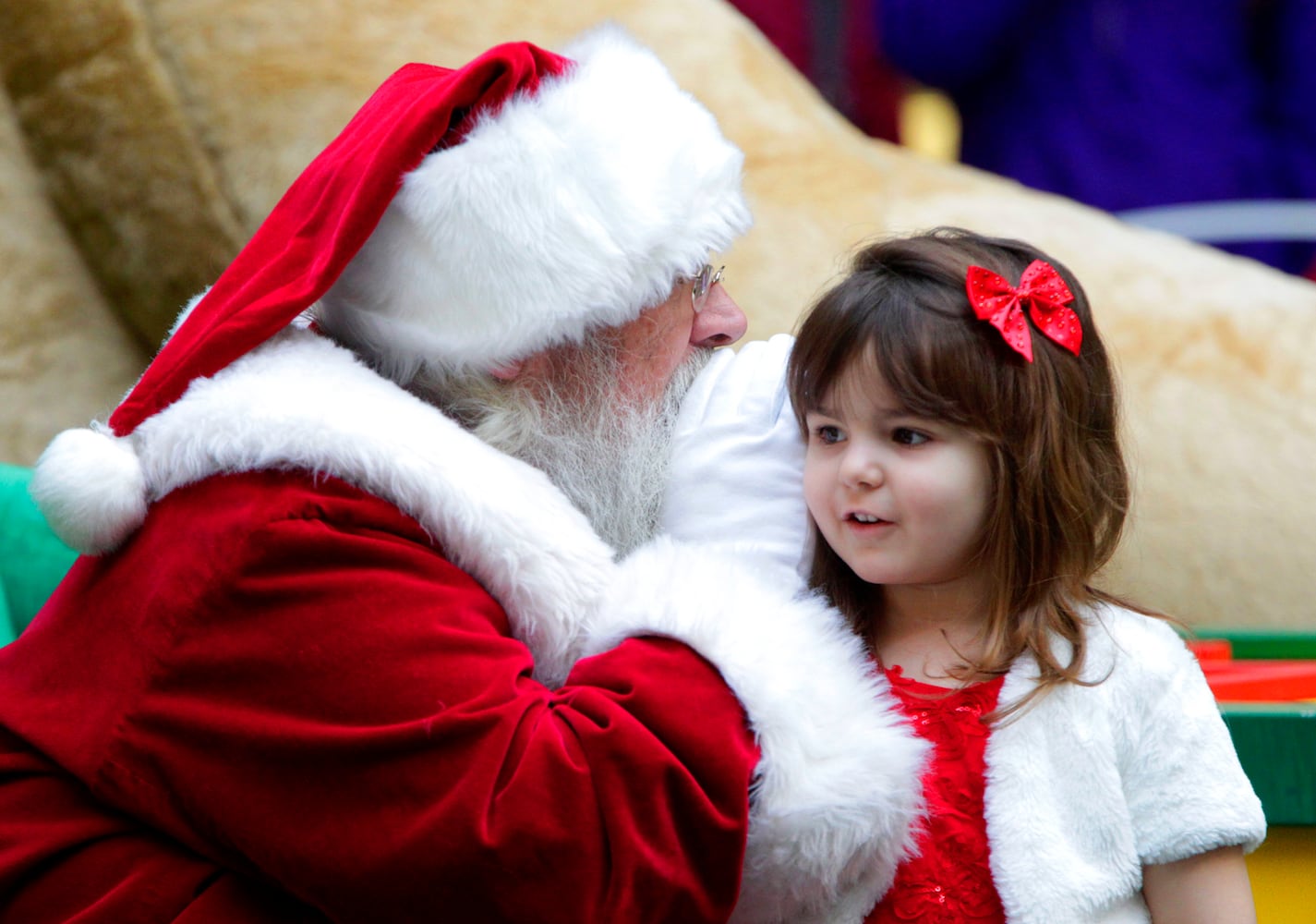 PHOTOS: A visit with Santa Claus makes the holiday season magical