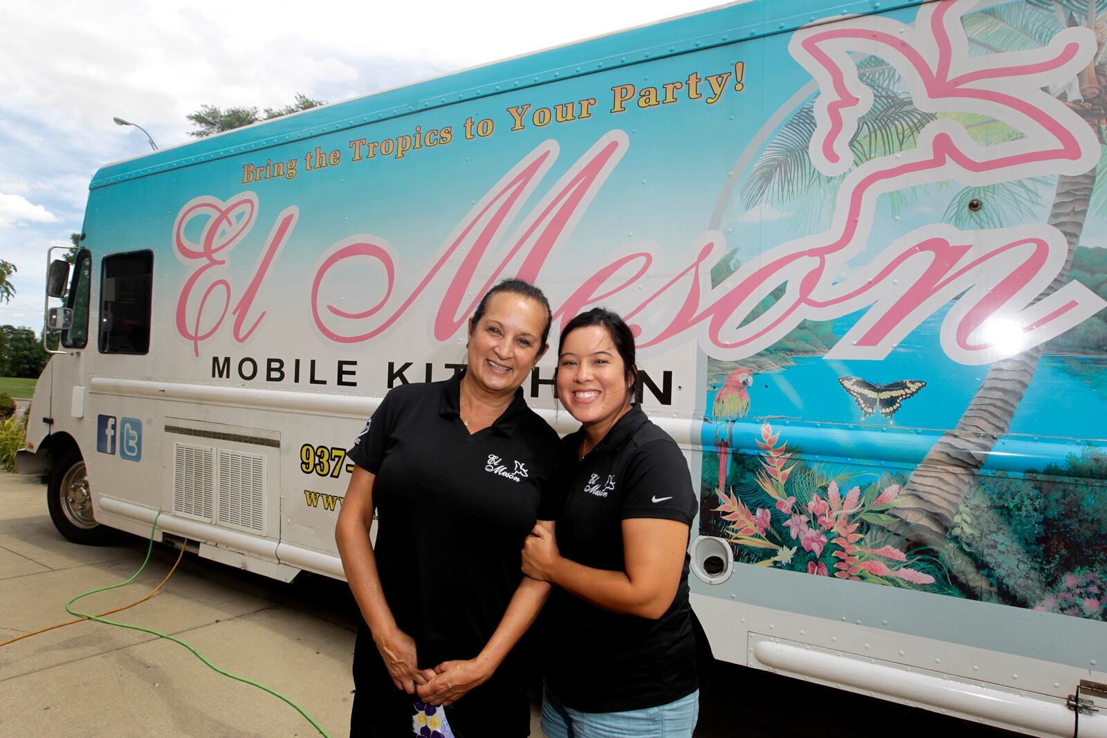 Marie Castro (left) and her daughter, Tatiana Lamley, run the El Meson food trucks. The restaurant, founded by Marie's parents, Herman and Gloria Castro, has six food trucks in its fleet. LISA POWELL / STAFF