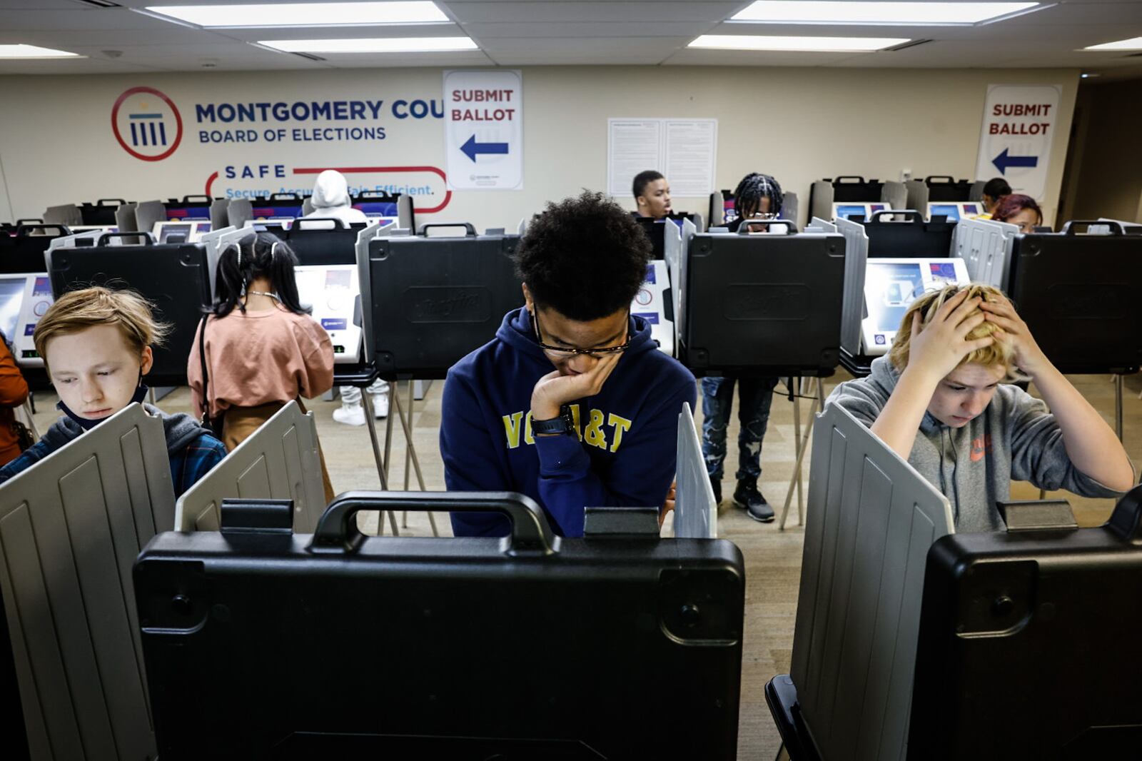 About 100 Dayton Public Schools seniors marched across the Third Street Bridge to the Montgomery County Board of Elections to vote for the first time Thursday, Oct. 12, 2023, during the 17th Dayton Teen Voting March. JIM NOELKER/STAFF