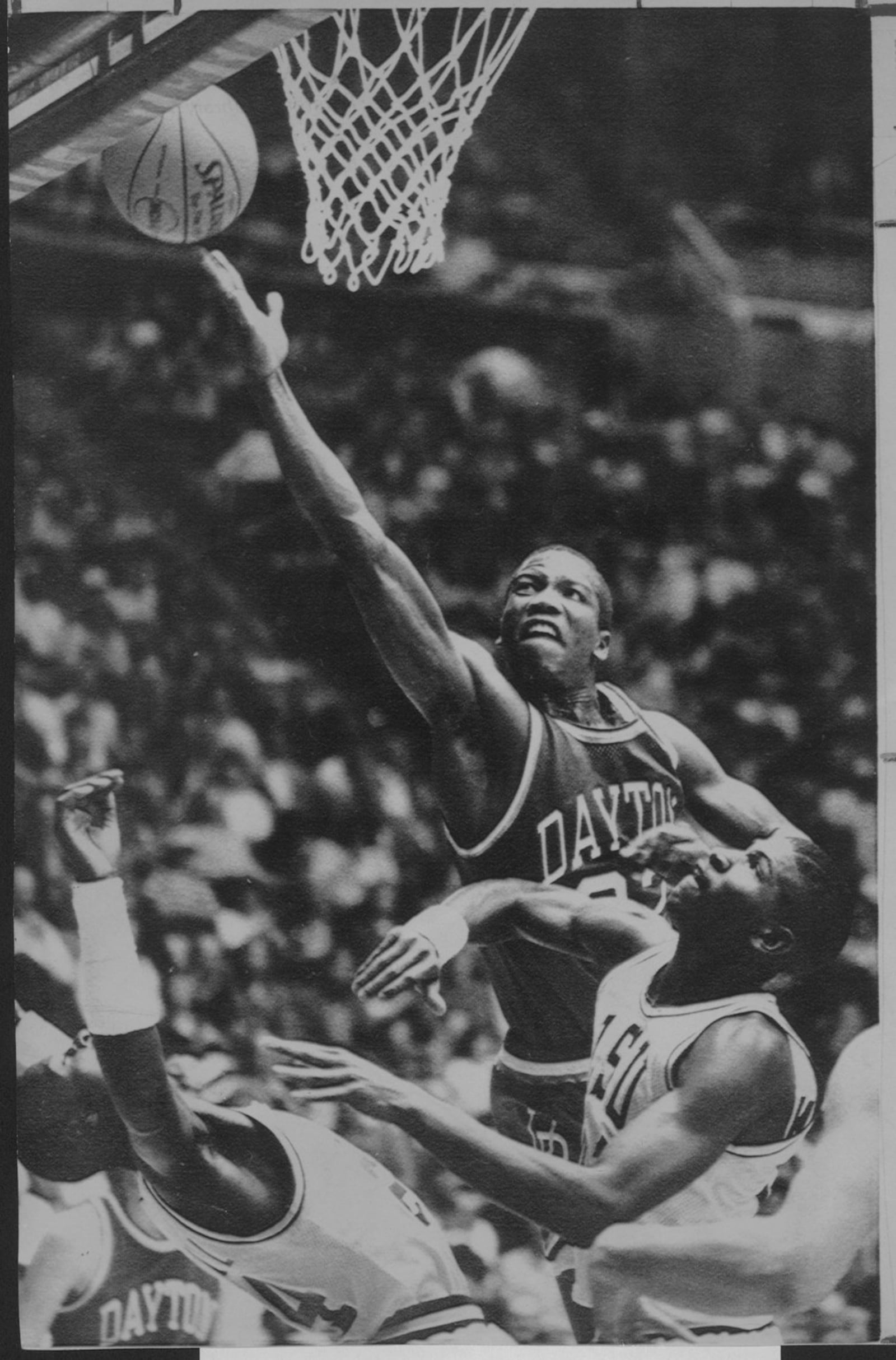 SALT LAKE CITY, UTAH, MARCH 16, 1984—-Roosevelt Chapman goes to the hoop as LSU defenders Leonard Mitchel, left, and Nikita Willson try to defend during NCAA game Thursday night in Salt Lake City.