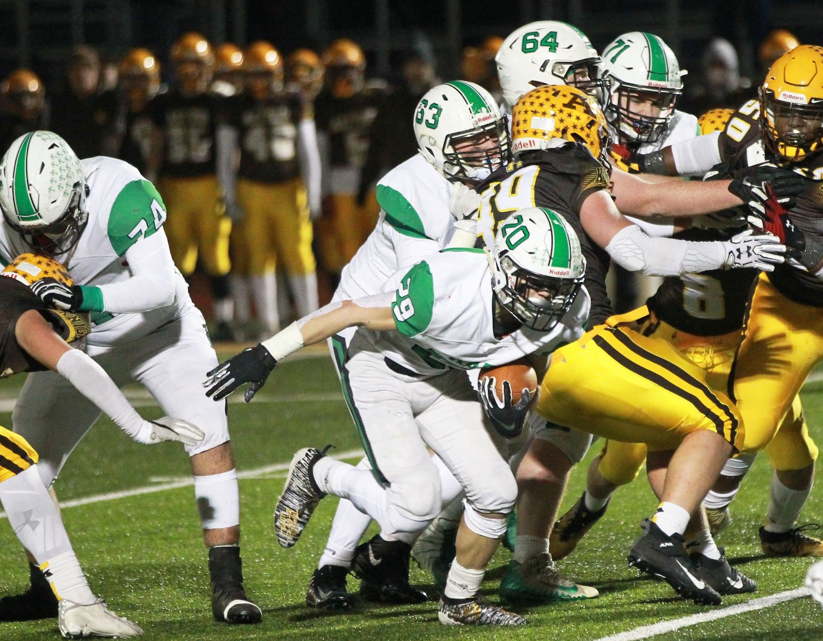 Badin senior Alex DeLong (with ball) rushed for a career-high 239 yards and one touchdown. Badin defeated Alter 38-21 in a D-III, Region 12 high school football semifinal at Monroe on Friday, Nov. 15, 2019. MARC PENDLETON / STAFF