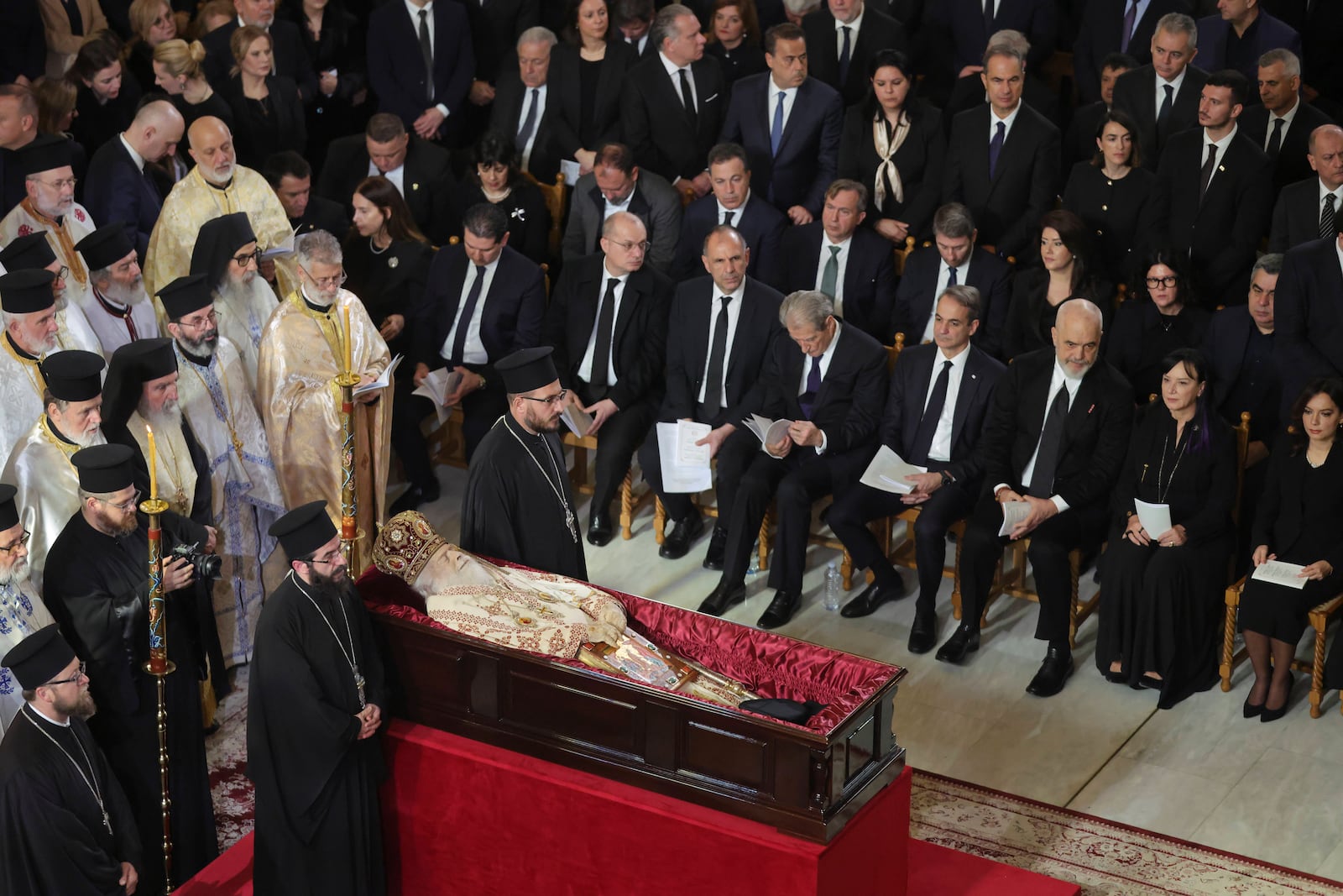 Officials and pilgrims attend the funeral of the late Archbishop Anastasios of Tirana, Durres and All Albania, inside the Cathedral of the Resurrection of Christ, in Tirana, Albania, Thursday, Jan. 30, 2025. (AP Photo/Vlasov Sulaj)