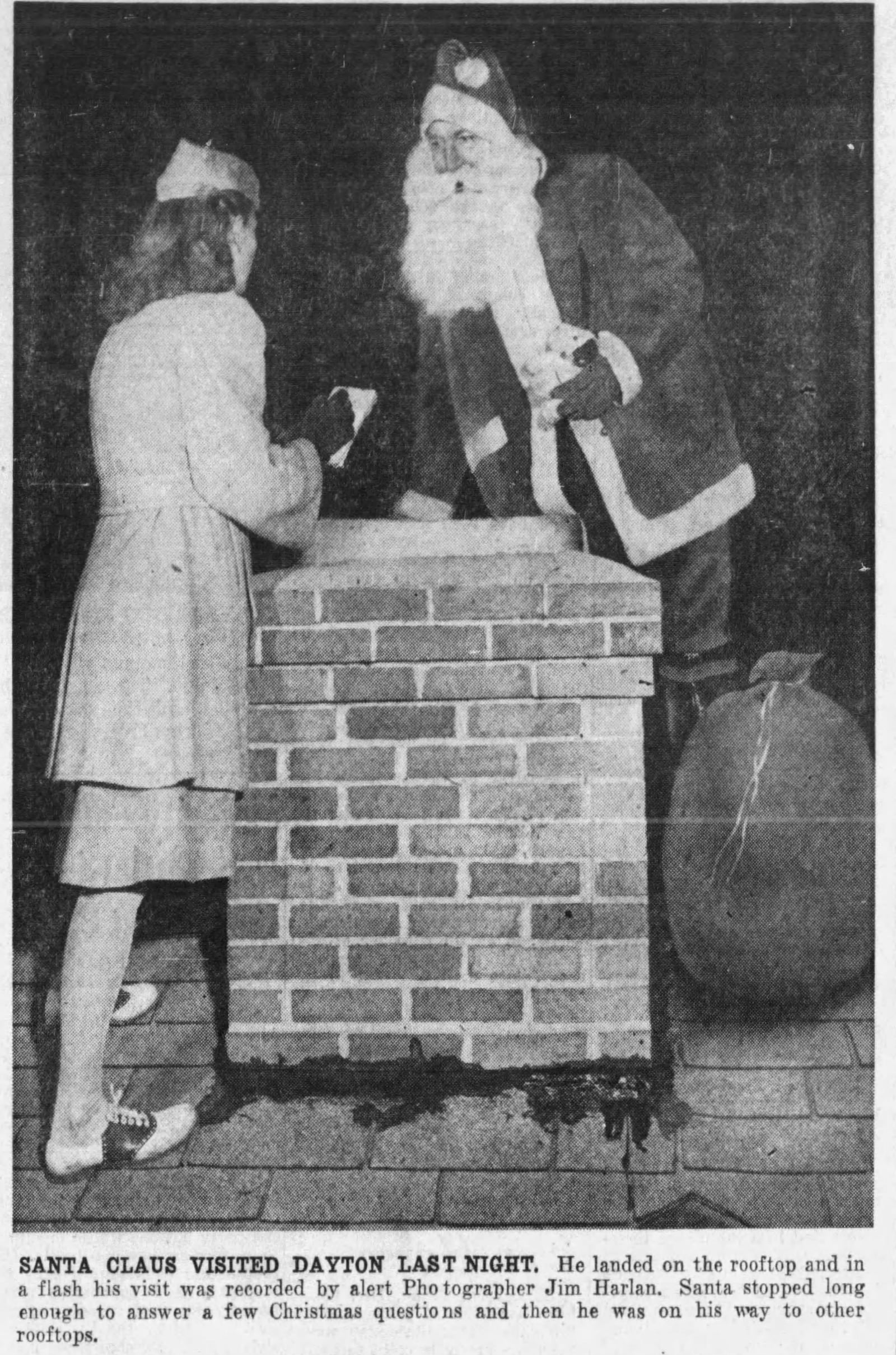 Dec. 25, 1947: Santa takes breather from rapid globe circling for interview here. DAYTON DAILY NEWS ARCHIVES