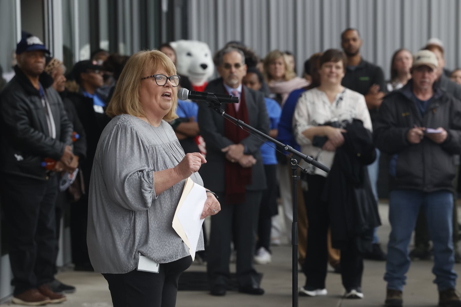 Tina Patterson, CEO of Homefull, speaks during a ribbon cutting ceremony Thursday, Feb. 6, 2025 for Homefull’s new Healthy Living in West Dayton project. BILL LACKEY/STAFF