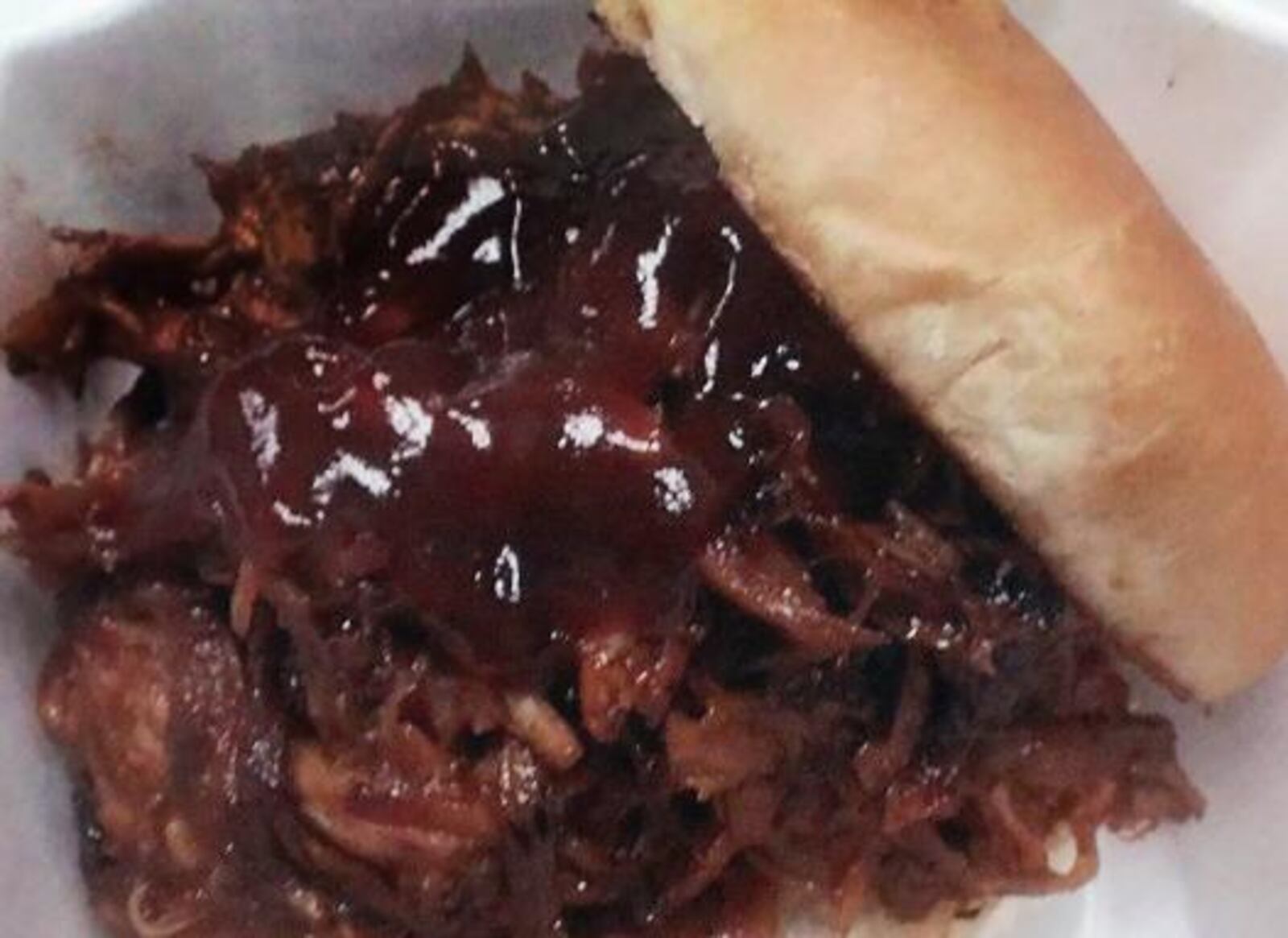 Pulled pork sandwich at Al’s Smokehouse. BILL LACKEY/STAFF