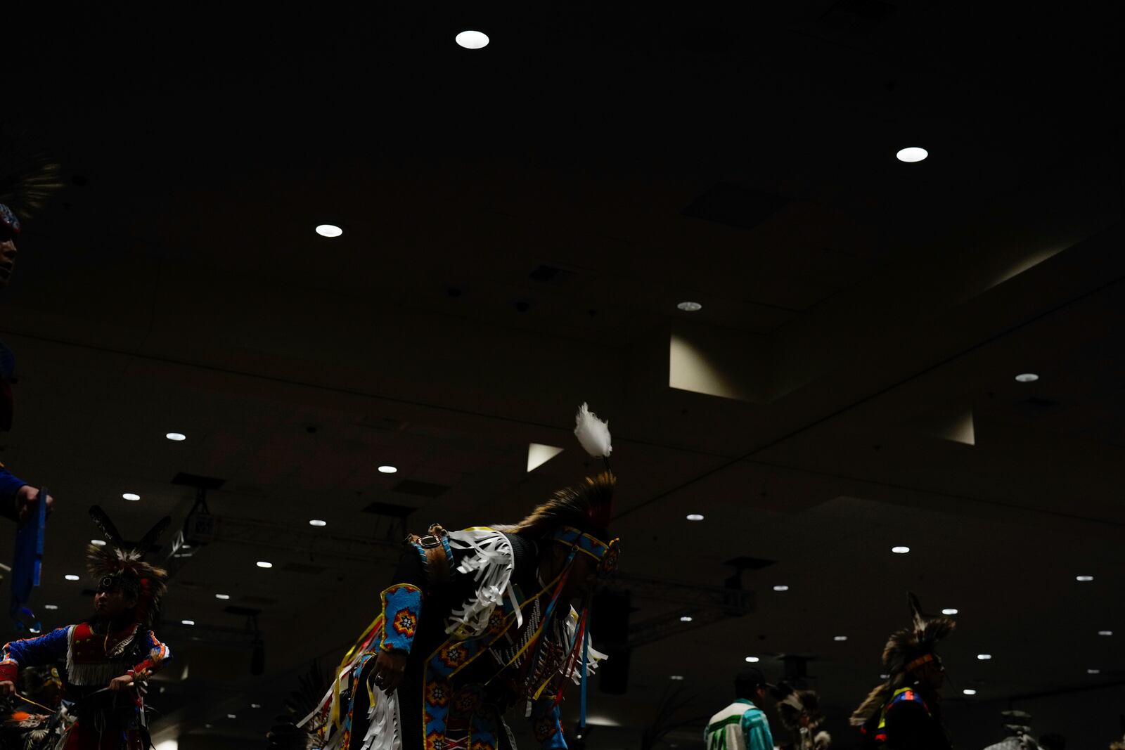 People dance during a powwow at Chinook Winds Casino Resort, Saturday, Nov. 16, 2024, in Lincoln City, Ore. (AP Photo/Jenny Kane)