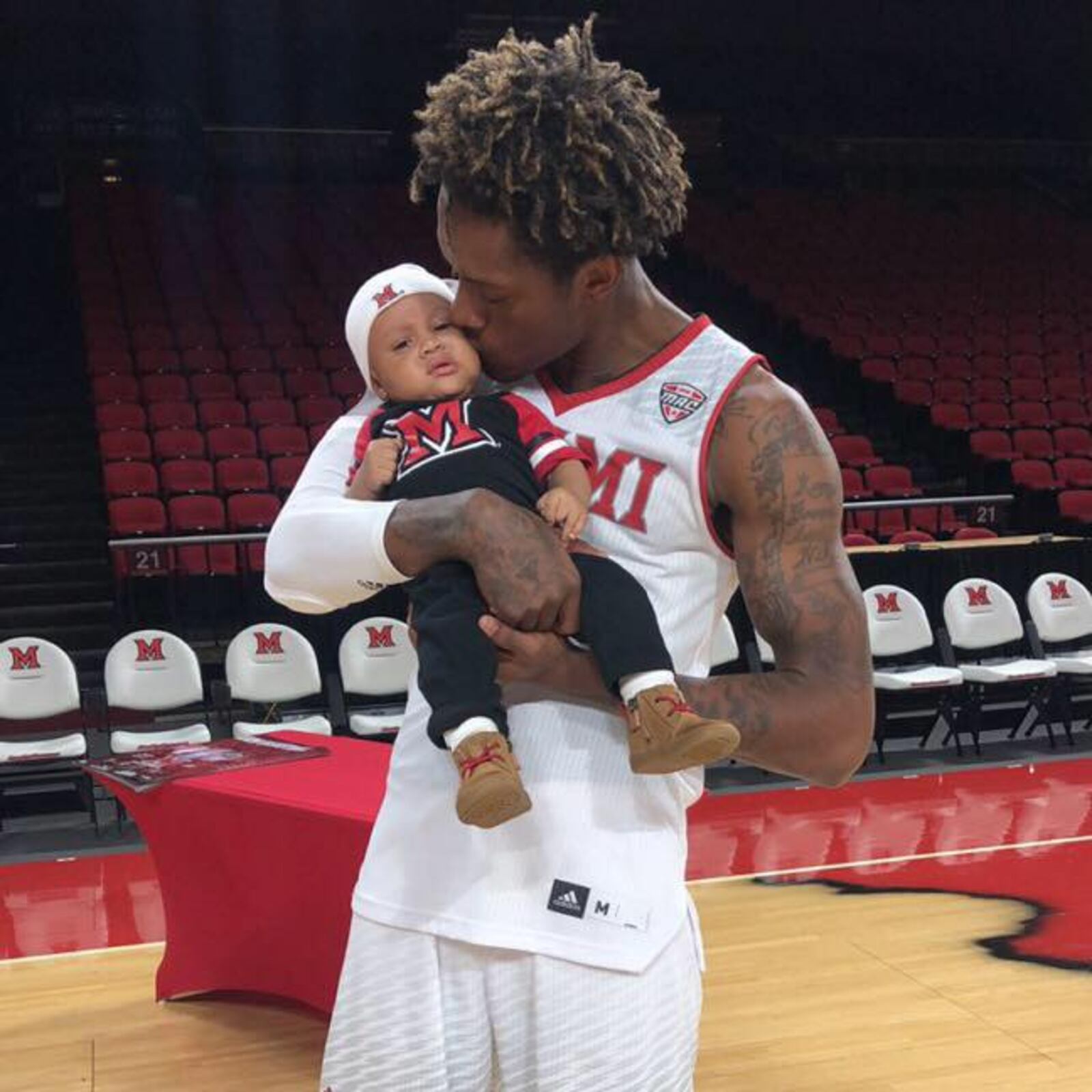 Miami basketball standout Dalonte Brown and his son Dalonte Jr. CONTRIBUTED