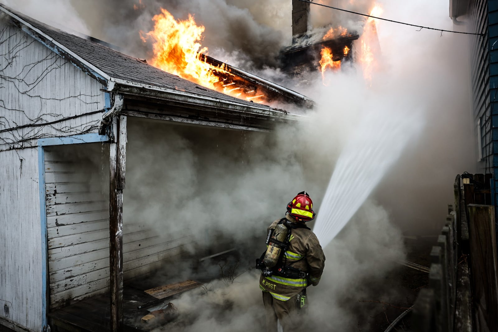 A vacant two-story house with a single-story addition in the back was destroyed by fire Thursday afternoon, Feb. 16, 2023, in the 100 block of June Street in Dayton. JIM NOELKER/STAFF