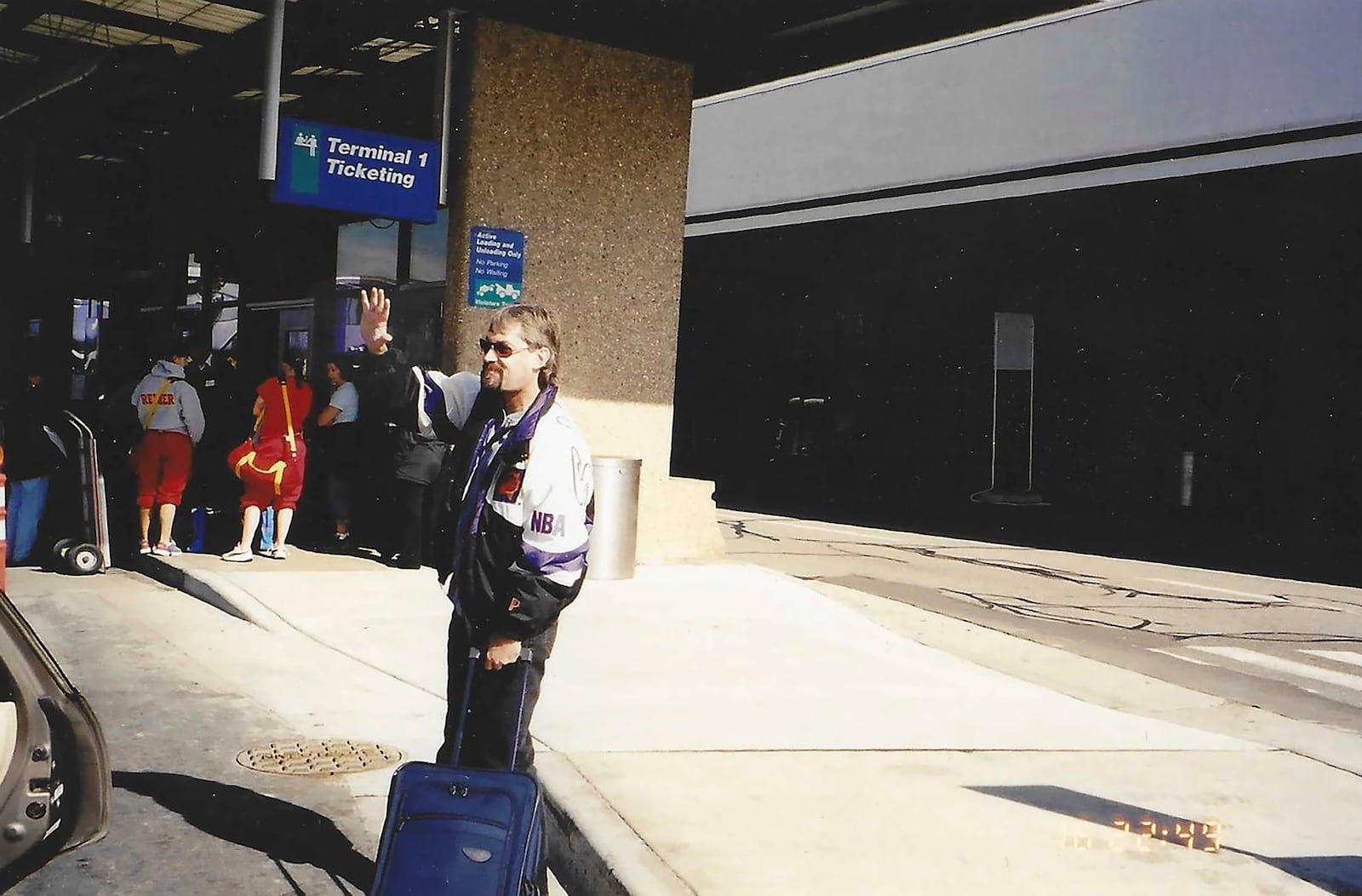 This undated photo provided by Karen Price shows Ted Price waving goodbye. (Karen Price via AP)