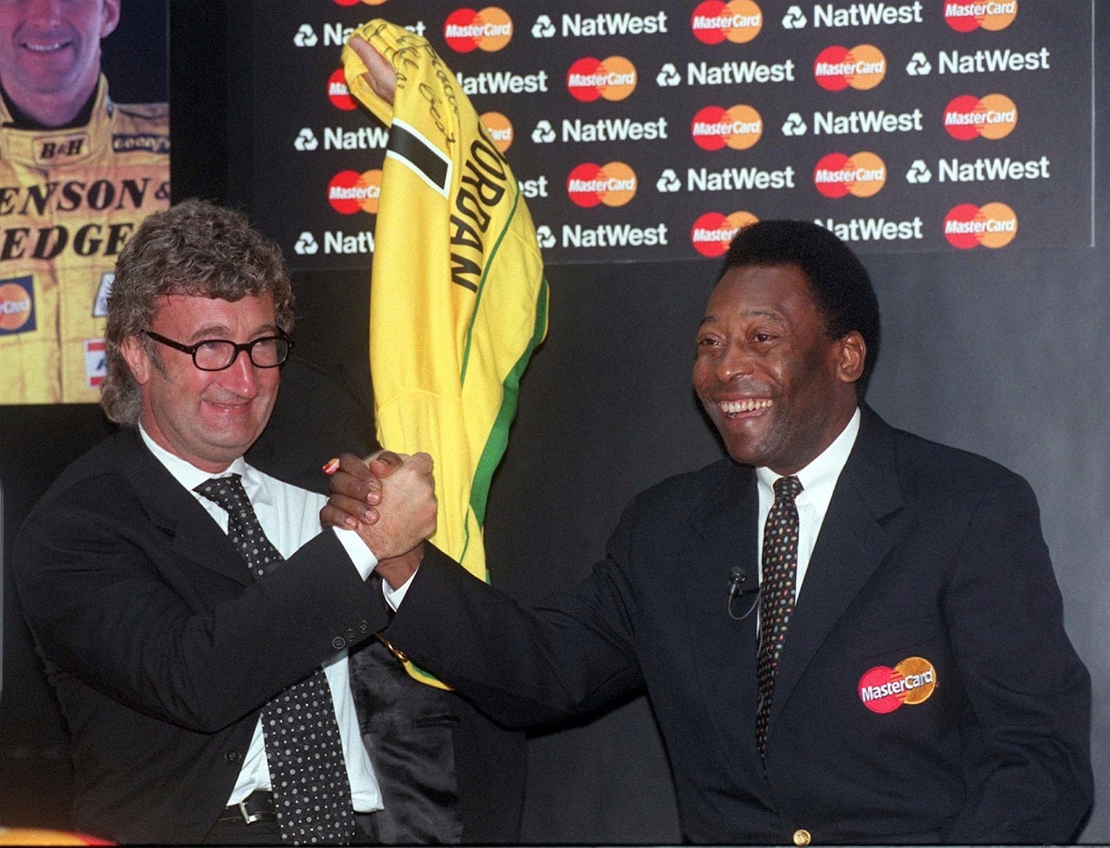 FILE - Eddie Jordan poses for a photo with former soccer player Pele, Nov. 6, 1998. (Sean Dempsey/PA via AP, File)