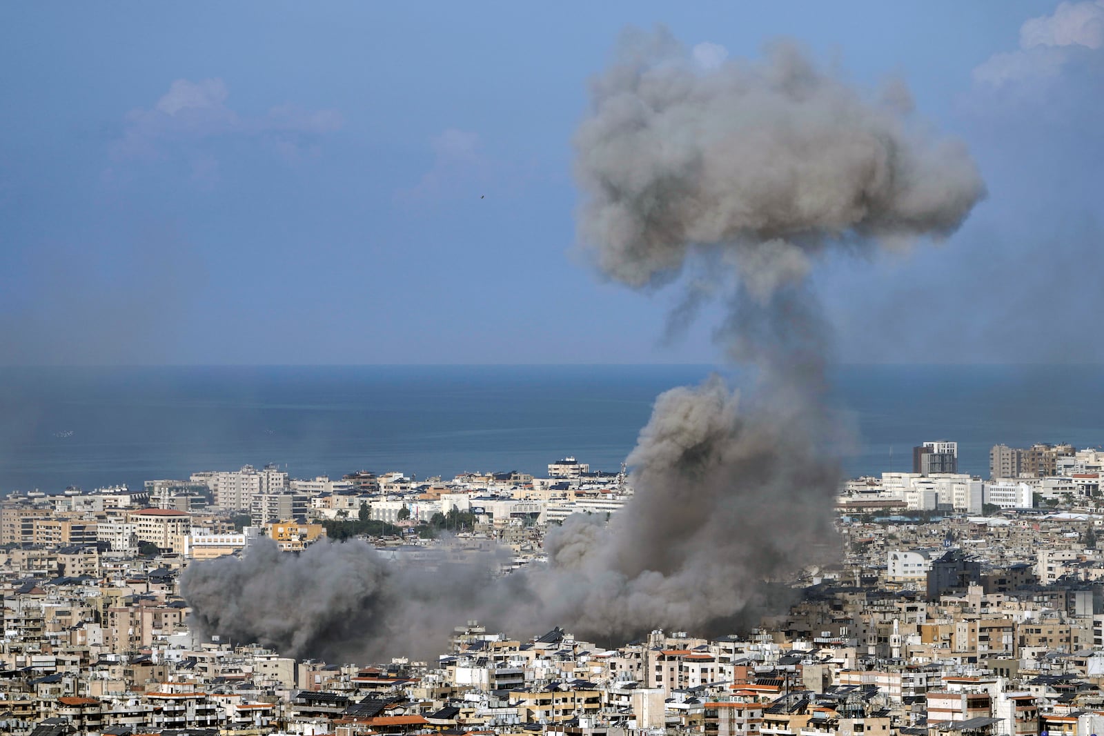 Smoke rises after an Israeli airstrike on Dahiyeh, in the southern suburb of Beirut, Lebanon, Saturday, Nov. 16, 2024. (AP Photo/Bilal Hussein)