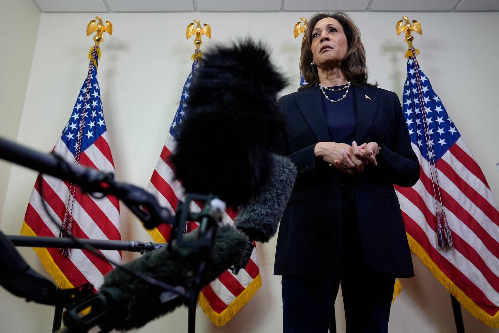 Democratic presidential nominee Vice President Kamala Harris speaks with reporters after attending a service at the Church of Christian Compassion, Sunday, Oct. 27, 2024, in Philadelphia. (AP Photo/Susan Walsh)