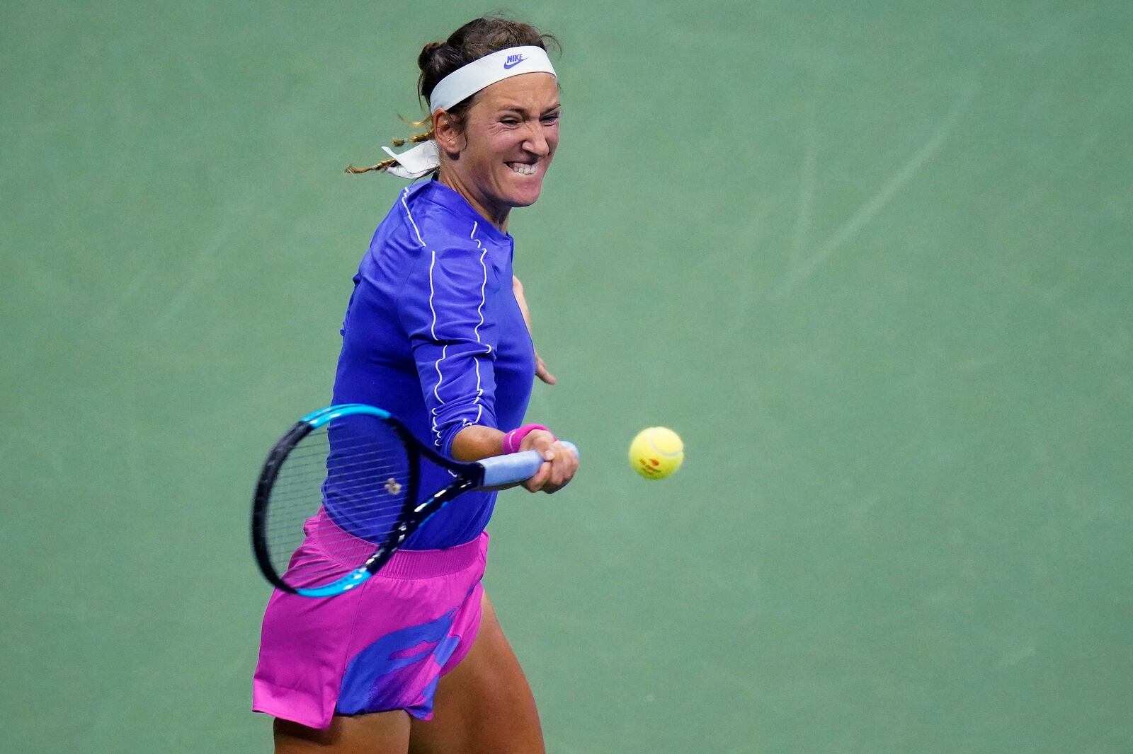 Victoria Azarenka, of Belarus, returns to Elise Mertens, of Belgium, during the quarterfinal round of the US Open tennis championships, Wednesday, Sept. 9, 2020, in New York. (AP Photo/Frank Franklin II)