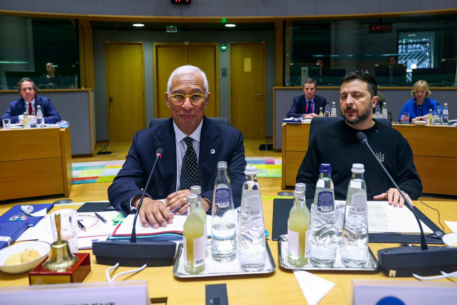 Ukraine's President Volodymyr Zelenskyy, right, and European Council President Antonio Costa attend a round table meeting during an EU summit in Brussels on Thursday, Dec. 19, 2024. (Johanna Geron, Pool Photo via AP)