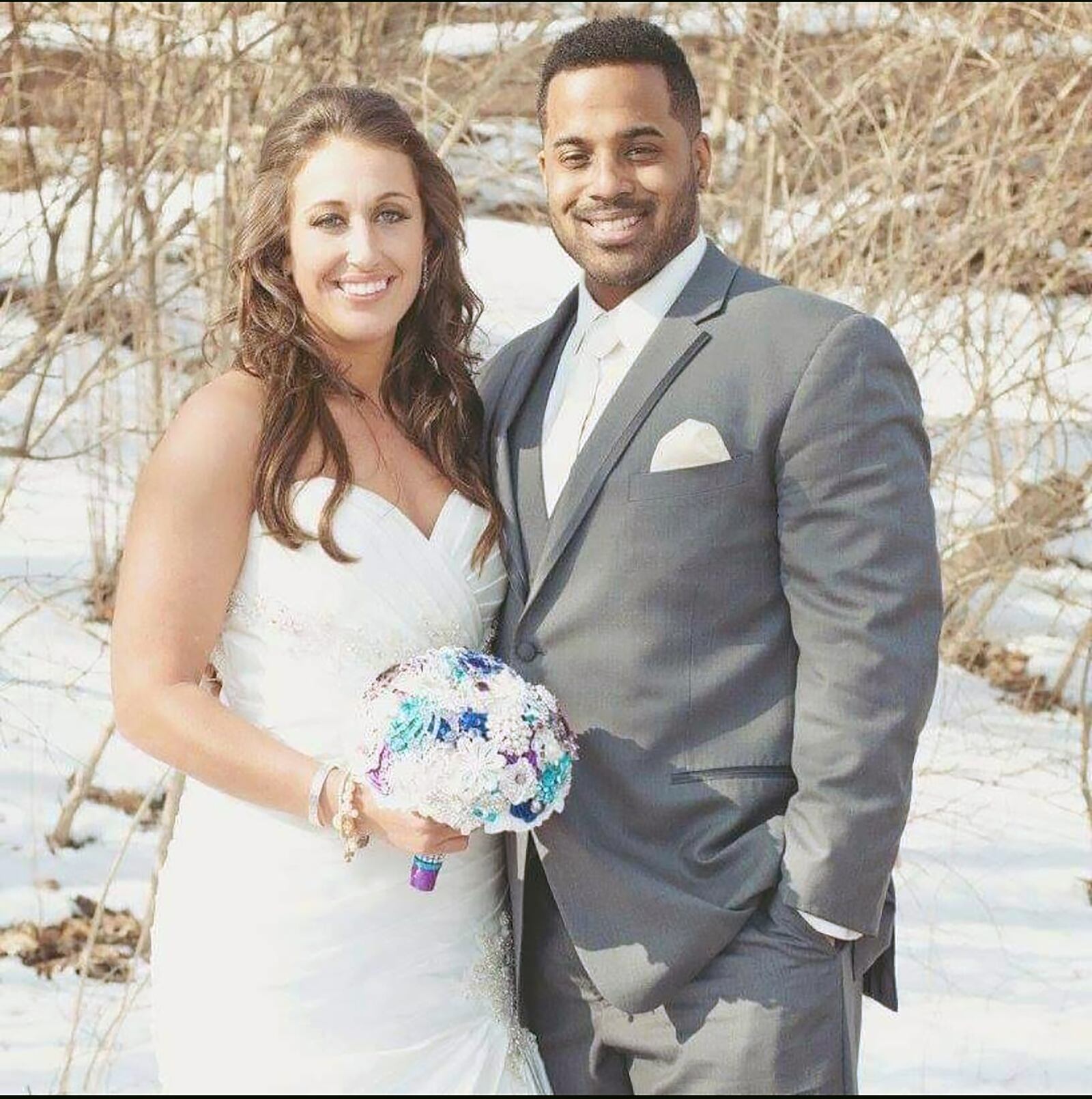 Cosby (R) with his wife Jena on their wedding day in February of 2015