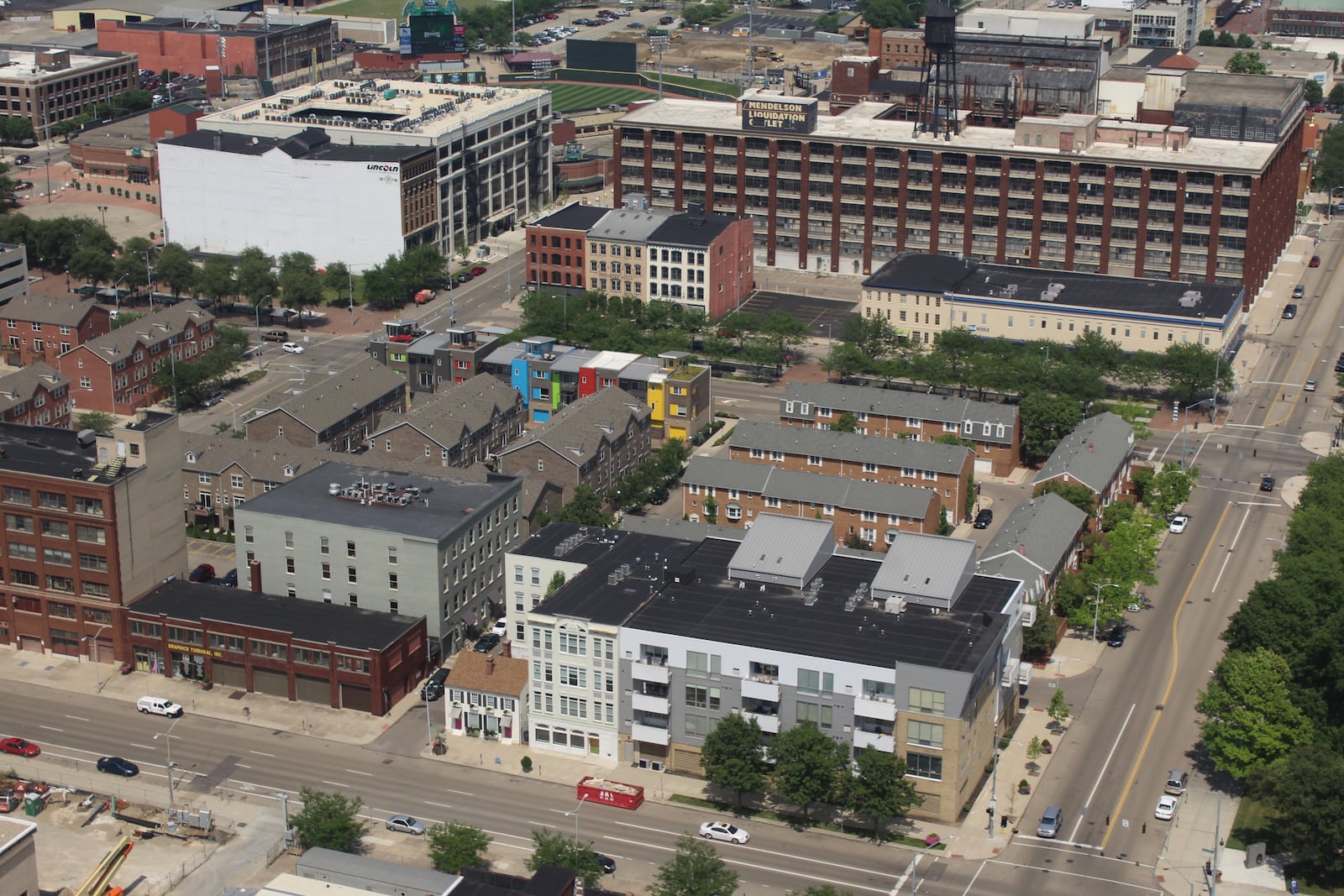 The Water Street developers plan to build a new apartment building called the Sutton on vacant land next to the Lincoln Storage building by the Day Air Ballpark, seen in the upper left part of this photo. CORNELIUS FROLIK / STAFF