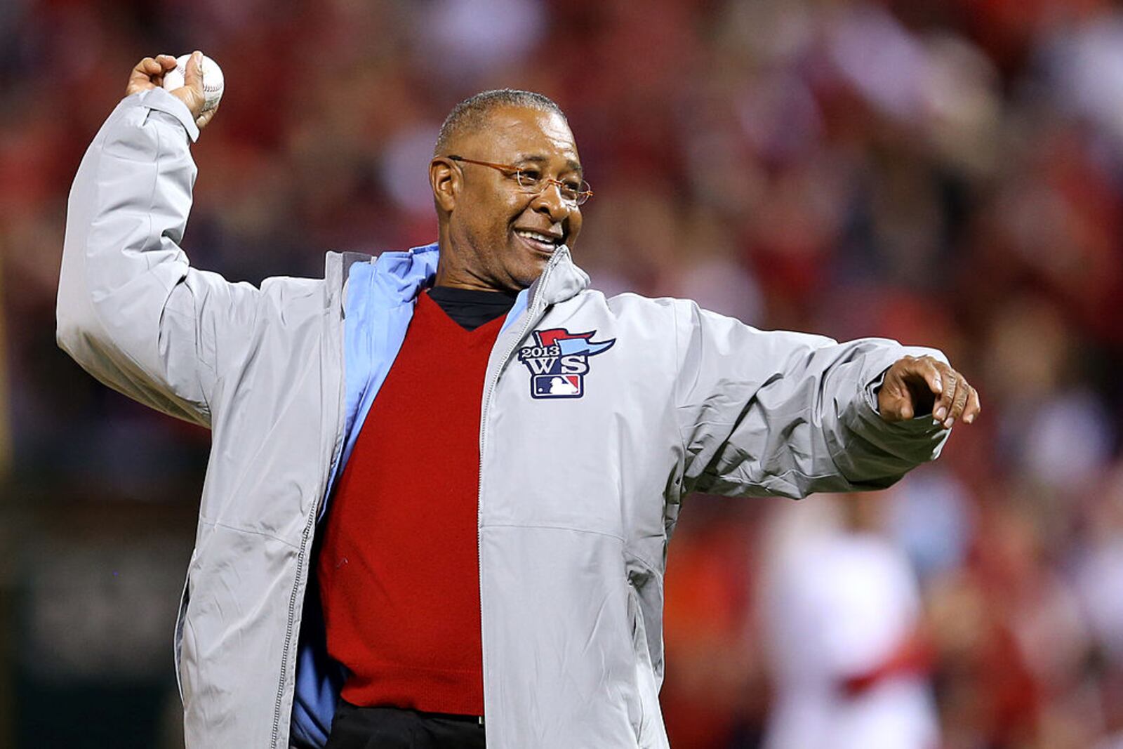 ST LOUIS, MO - OCTOBER 28: Hall of Famer Ozzie Smith throws the ceremonial first pitch prior to Game Five of the 2013 World Series between the St. Louis Cardinals and the Boston Red Sox at Busch Stadium on October 28, 2013 in St Louis, Missouri. (Photo by Rob Carr/Getty Images)