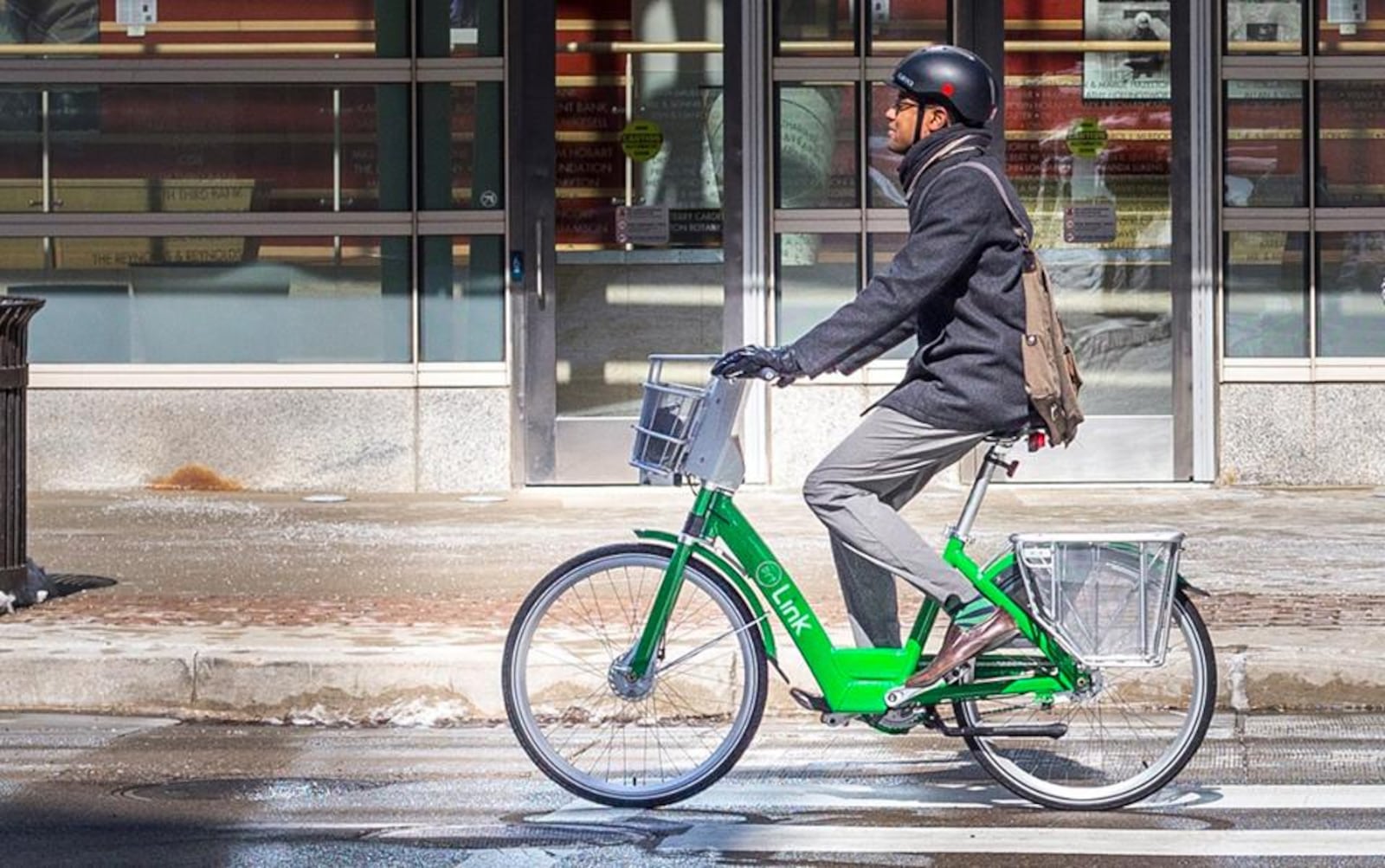 Oregon District resident Omar J. Peters rides a Link Dayton Ride Share bike (Source: Facebook)