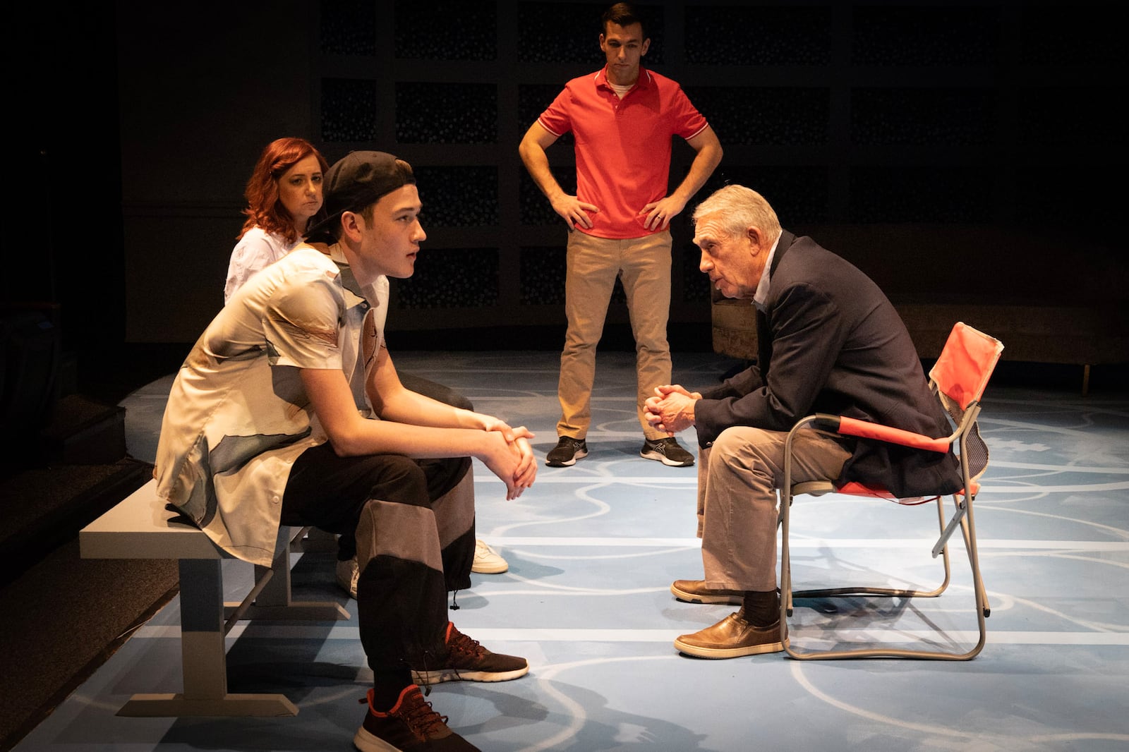 Left to right: Heather Atkinson (Mia), Casen Kidd (The Boy), George Merusi (Toby) and John S. Kasper (Coach Tanner Hale) in Dayton Theatre Guild's production of "For the Loyal." PHOTO BY RICK FLYNN PHOTOGRAPHY