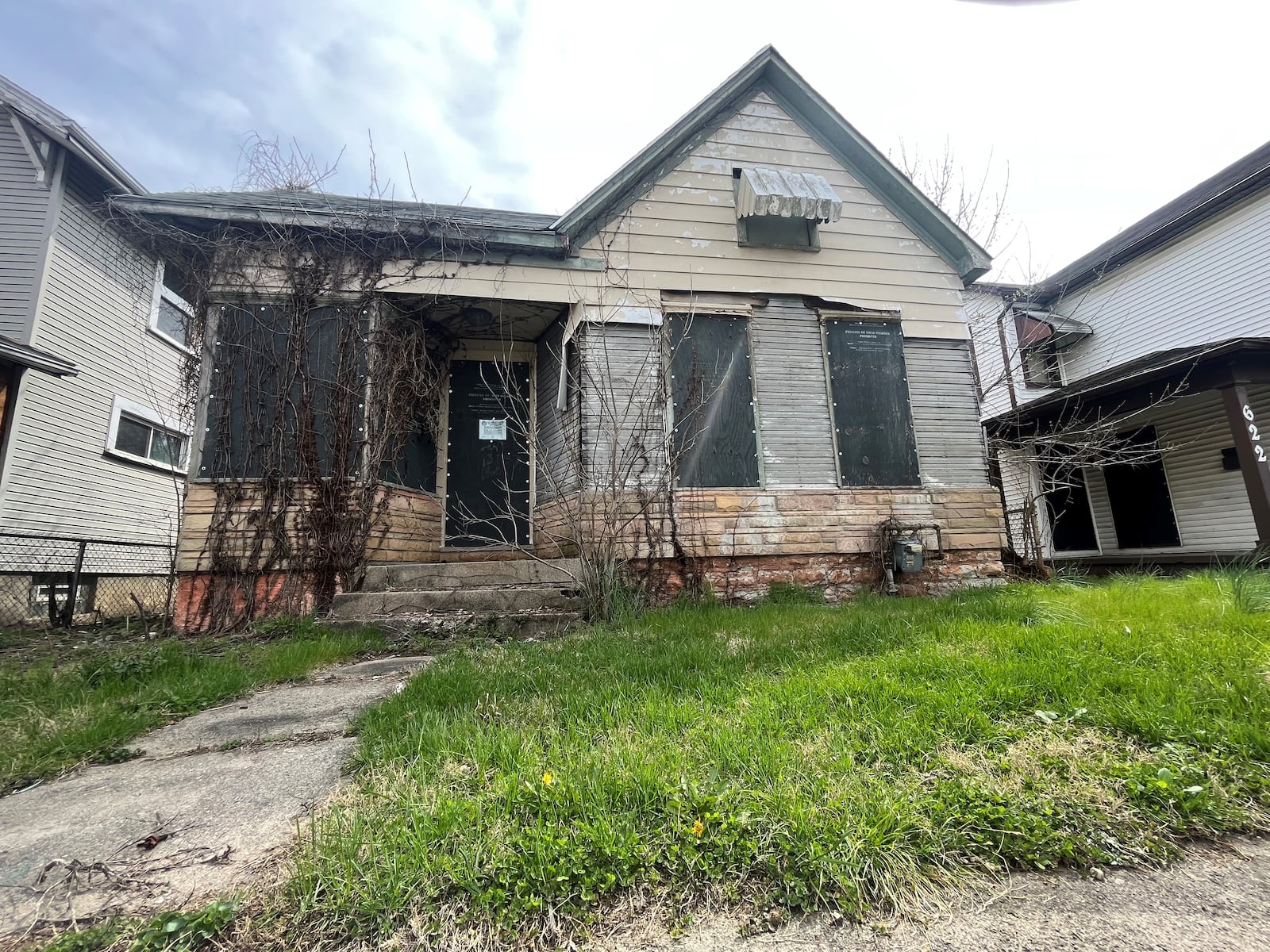 A vacant and abandoned home in East Dayton. CORNELIUS FROLIK / STAFF