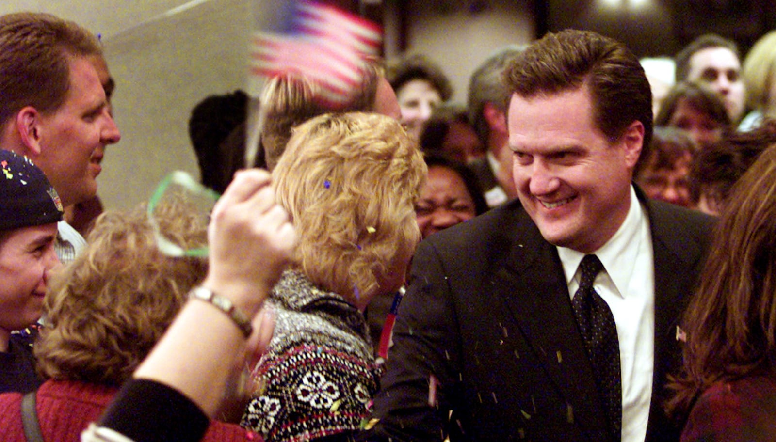 Former Dayton mayor Mike Turner enters the ballroom  of the Doubletree Hotel with a win over Rick Carne in the Third District to capture Tony Hall's former  seat.