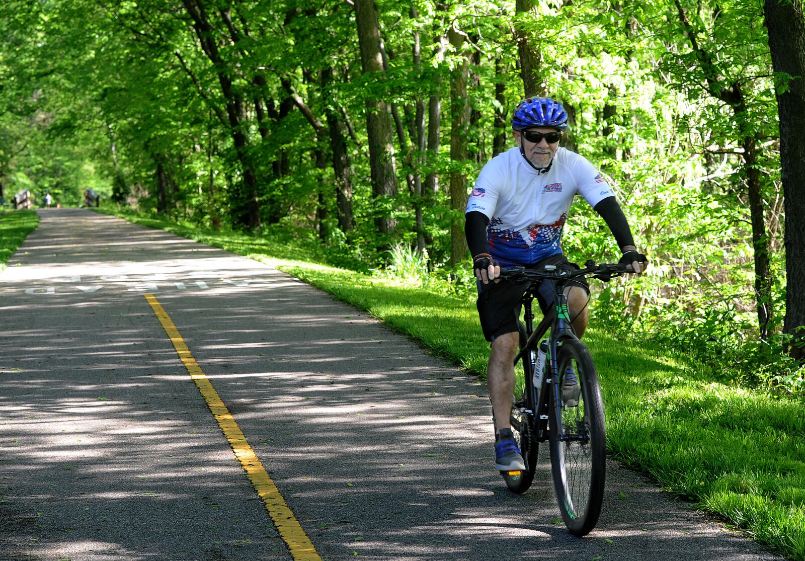 Warriors on Wheels founder Gil Esparza enjoys a bike ride near Xenia, Wednesday May 17, 2023. MARSHALL GORBY\STAFF