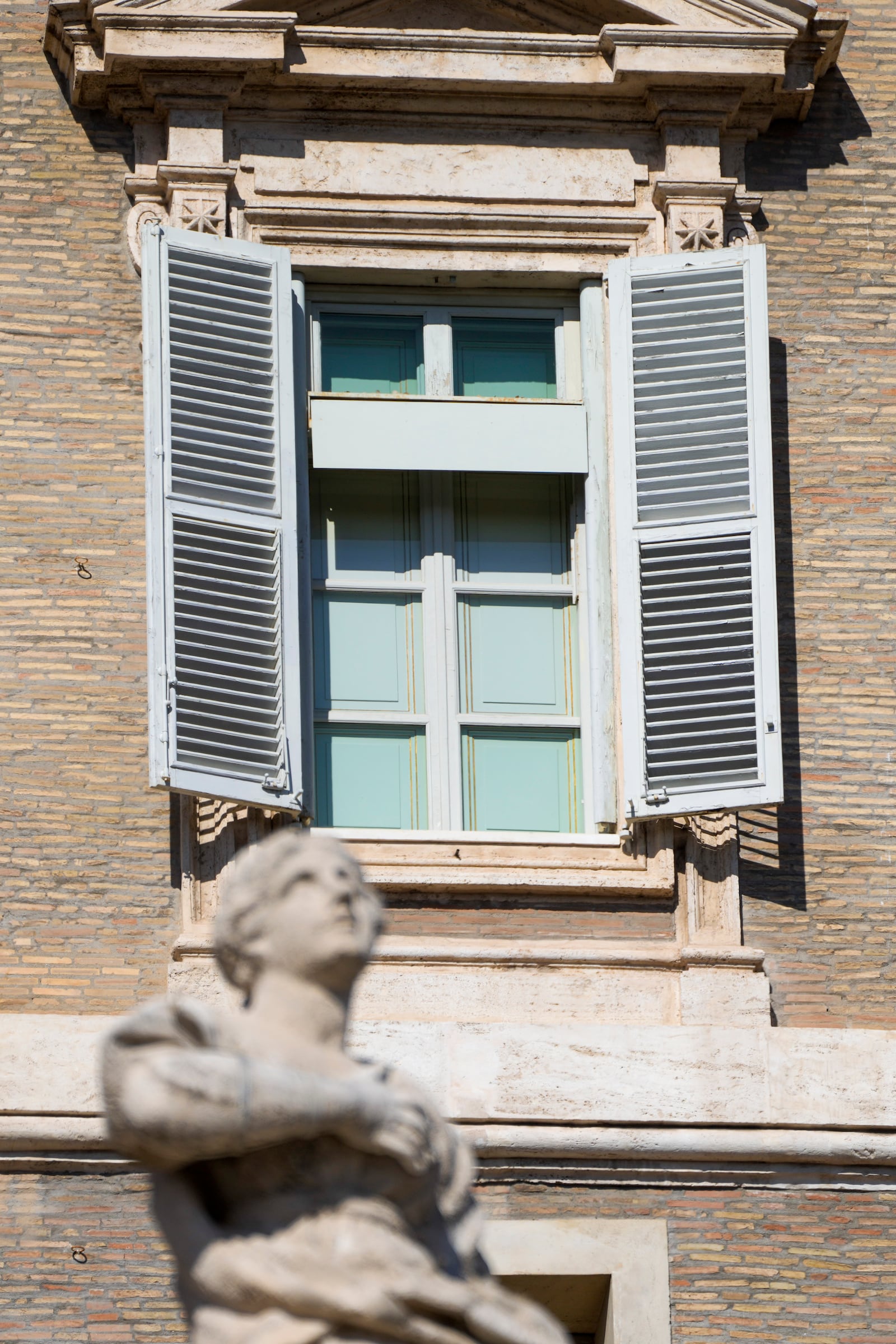 The window of the Apostolic Palace at The Vatican, Sunday, Feb. 16, 2025, from where Pope Francis, who was hospitalised on Friday, blesses the faithful gathered in St. Peter's Square after the Angelus every Sunday is closed. (AP Photo/Gregorio Borgia)