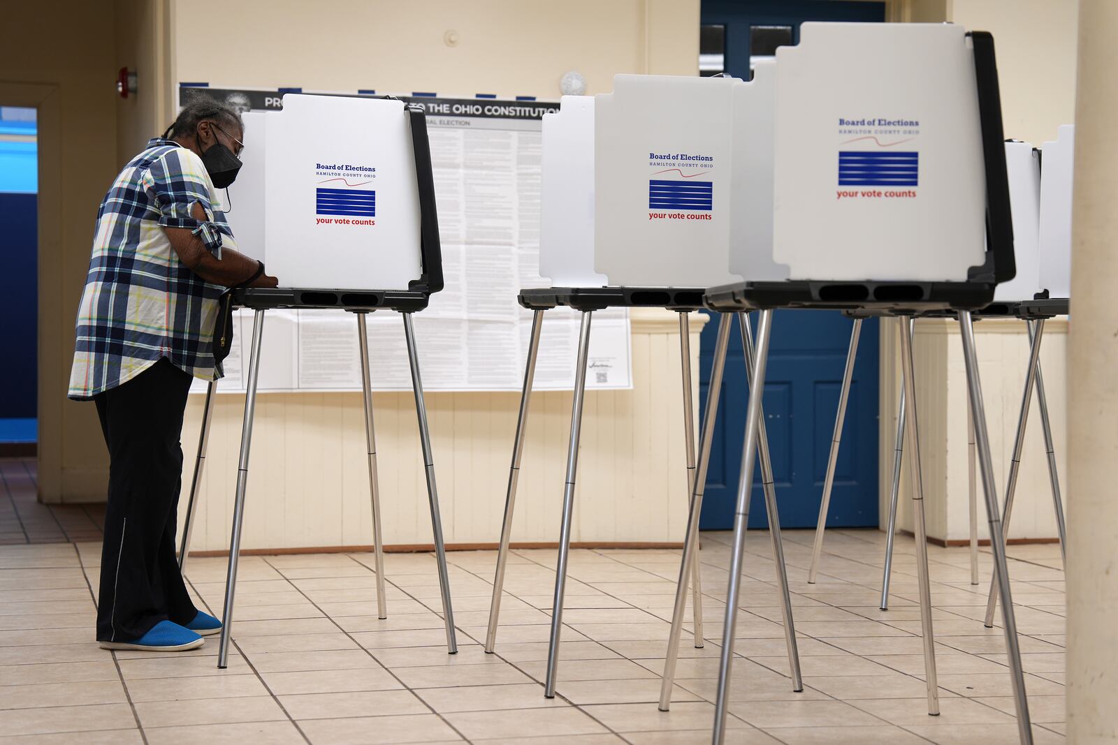 Patricia Jackson, 74, of Cincinnati, votes on Election Day at the Church of Our Savior, Tuesday, Nov. 5, 2024, in the Mount Auburn neighborhood of Cincinnati. (AP Photo/Kareem Elgazzar)