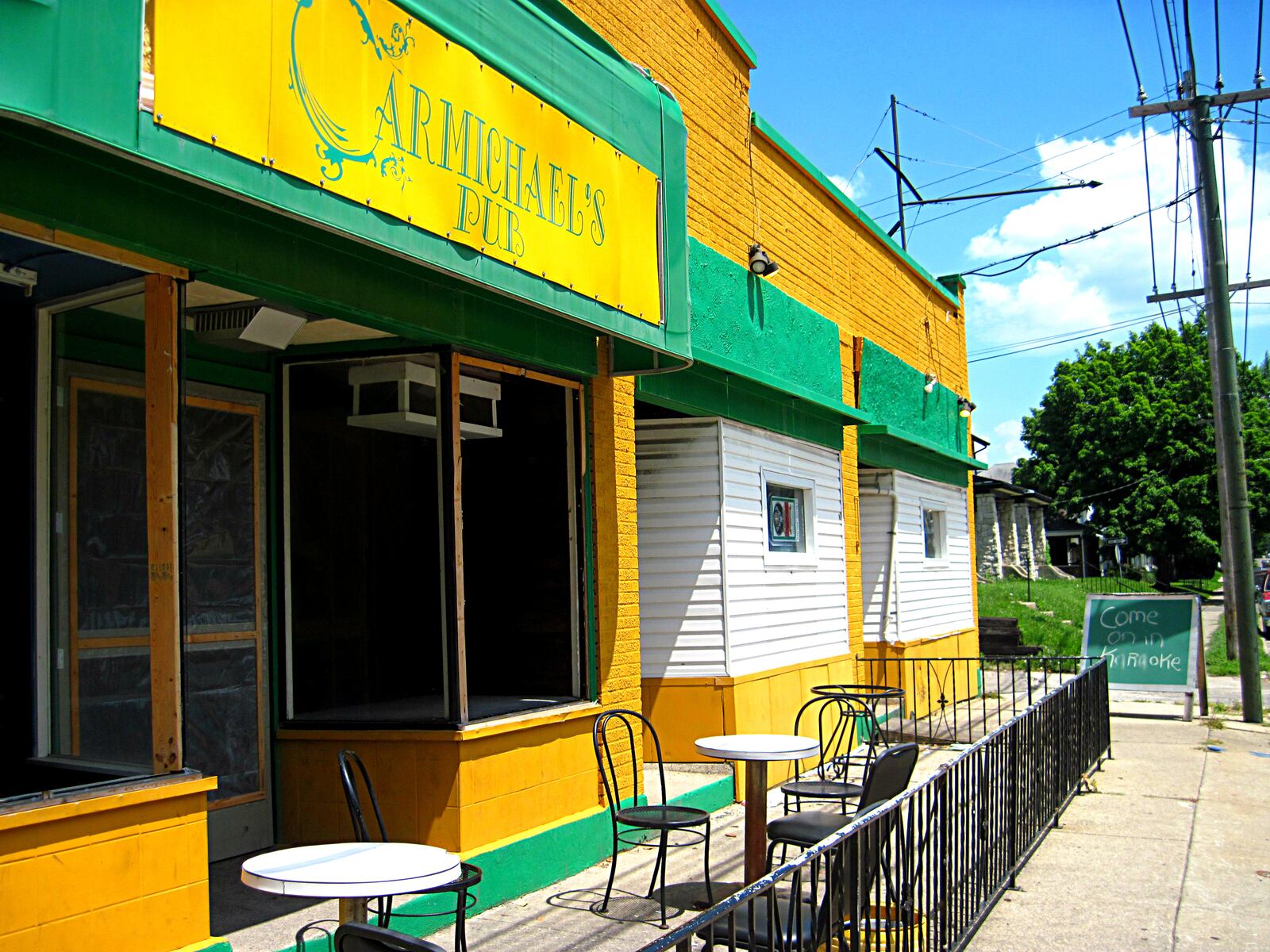 Carmichael's Pub, 3011 Wayne Ave., is the place to run into neighbors and regulars in the Walnut Hills neighborhood. Walnut Hills sits on about 250 acres of Dayton land running the length of Wayne and Wyoming Avenues up to Watervliet Avenue and Pursell Avenue. VIVIENNE MACHI / STAFF