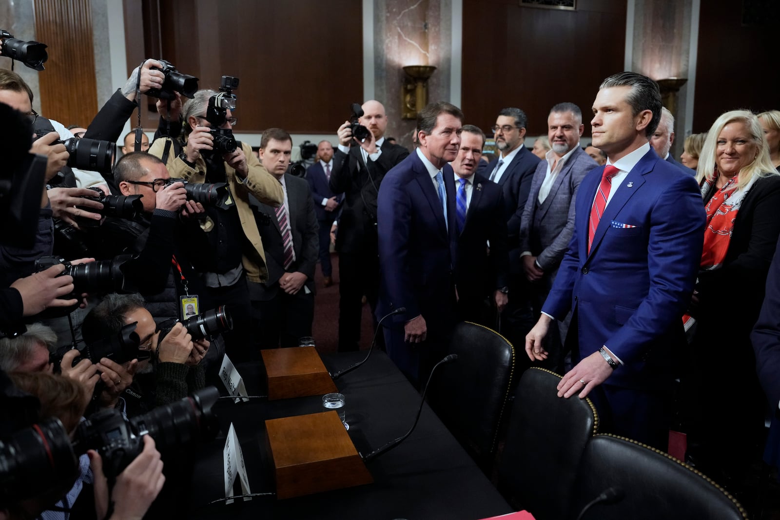 Pete Hegseth, President-elect Donald Trump's choice to be Defense secretary, arrives before the Senate Armed Services Committee for his confirmation hearing, at the Capitol in Washington, Tuesday, Jan. 14, 2025. (AP Photo/Ben Curtis)