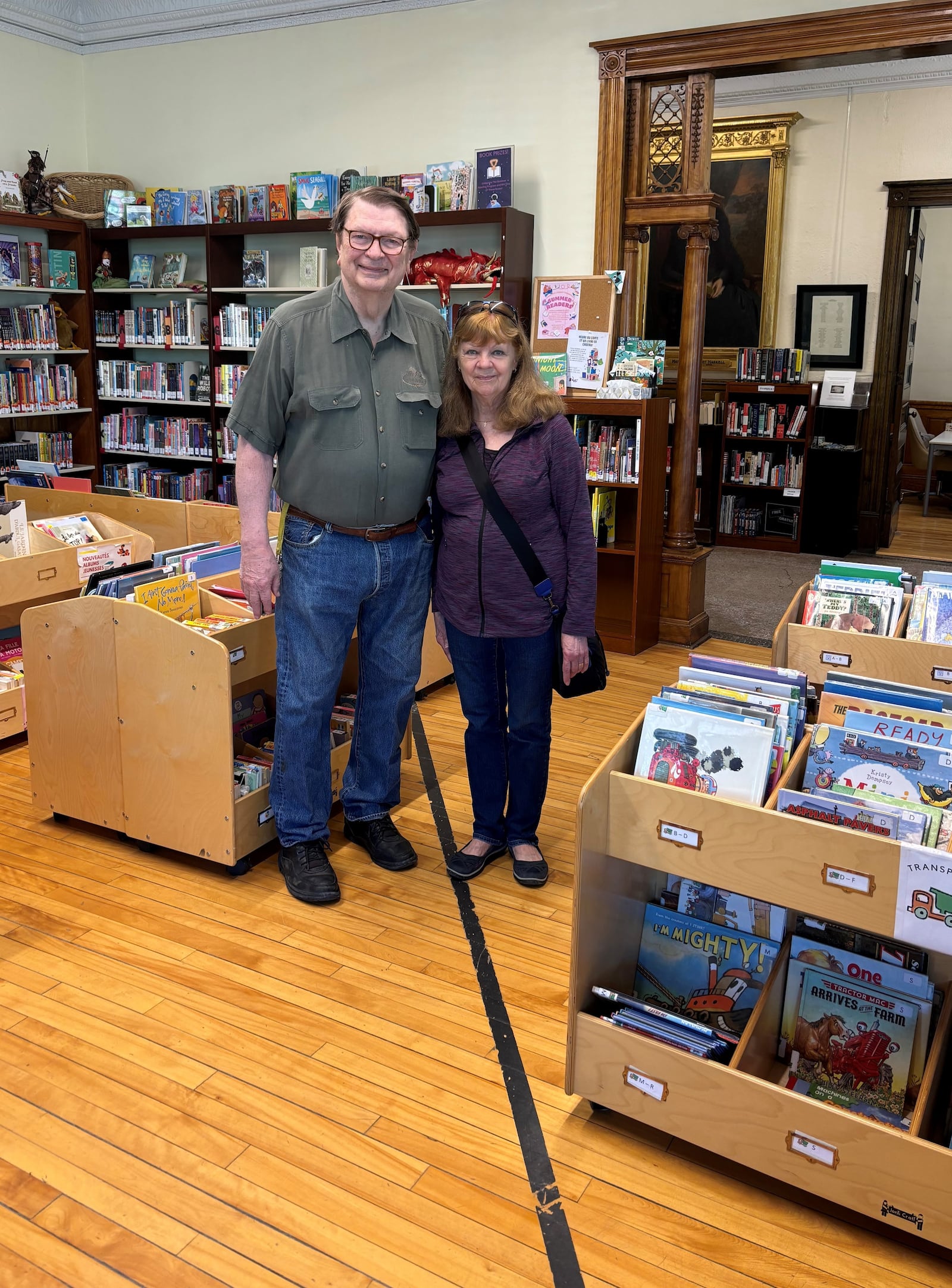 Merle Wilberding and the dividing line at the Haskell Free Library & Opera House. (CONTRIBUTED)