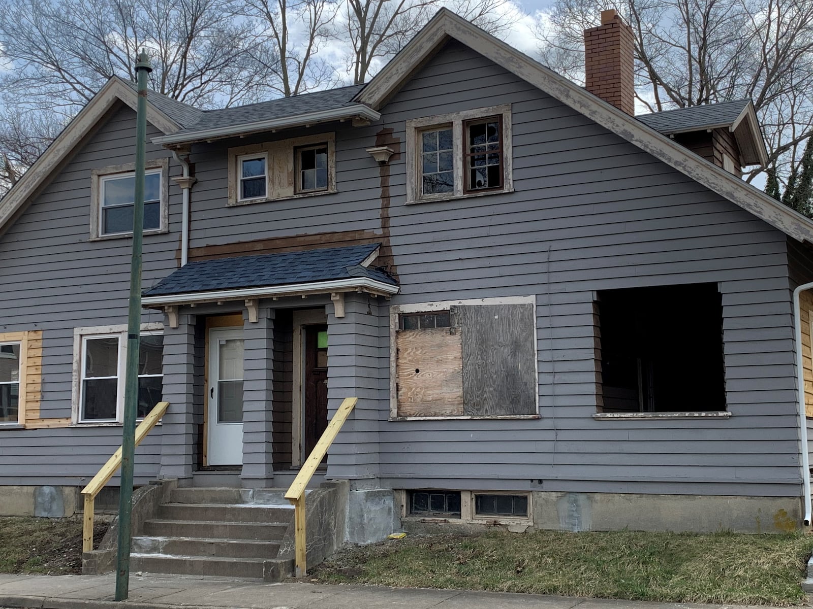 The owners of this duplex on Neal Avenue in Dayton received $10,350 in rental assistance last year through a Montgomery County program funded with federal CARES Act funds. The house is empty and had no water service last year.